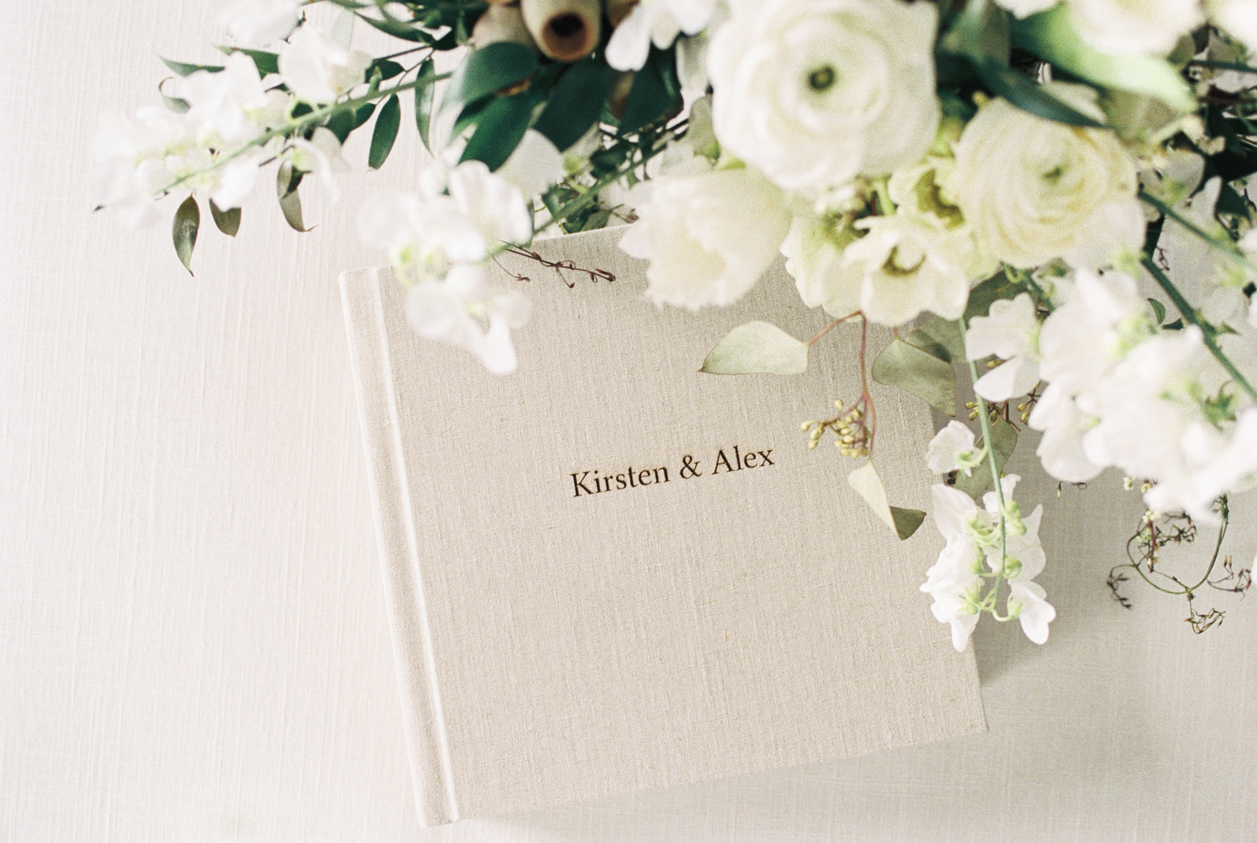 heirloom wedding albums in linen and leather