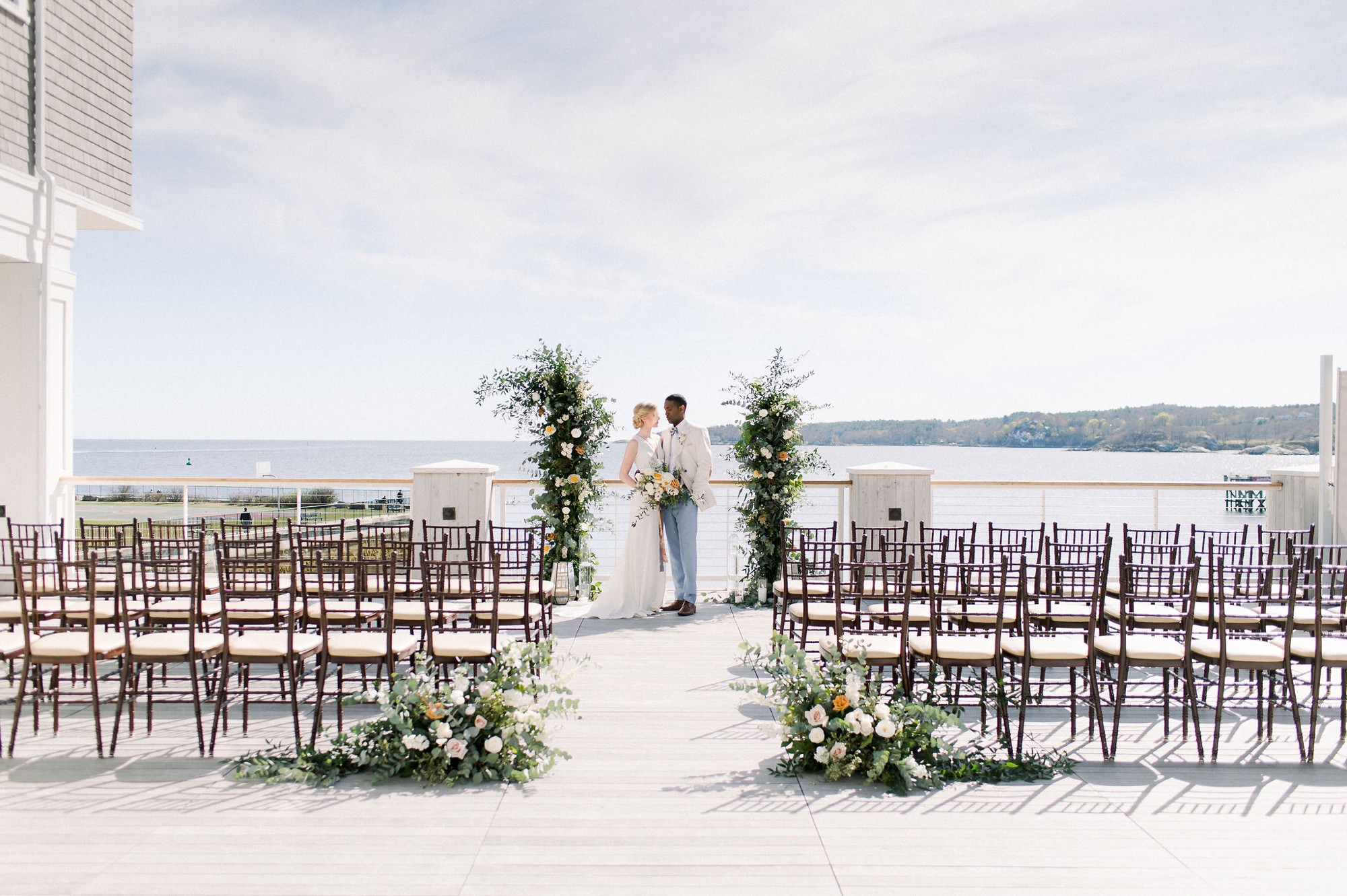 Gloucester MA Beauport Hotel Wedding | Tuscan meets modern | outdoor ceremony by the ocean with flower pillars and modern looks for bride and groom | summer wedding