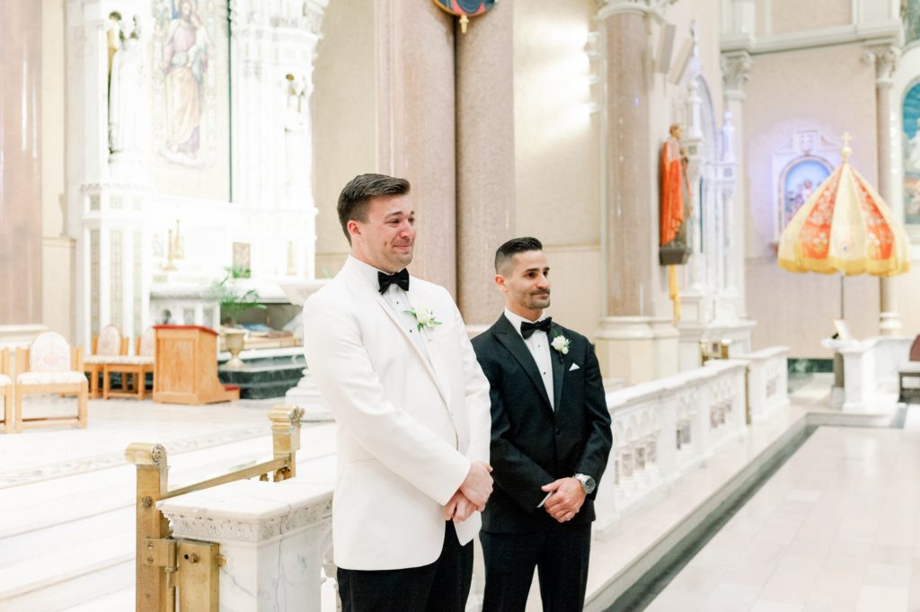 Boston wedding ceremony at Boston's Basilica groom tears up as bride walks down the aisle