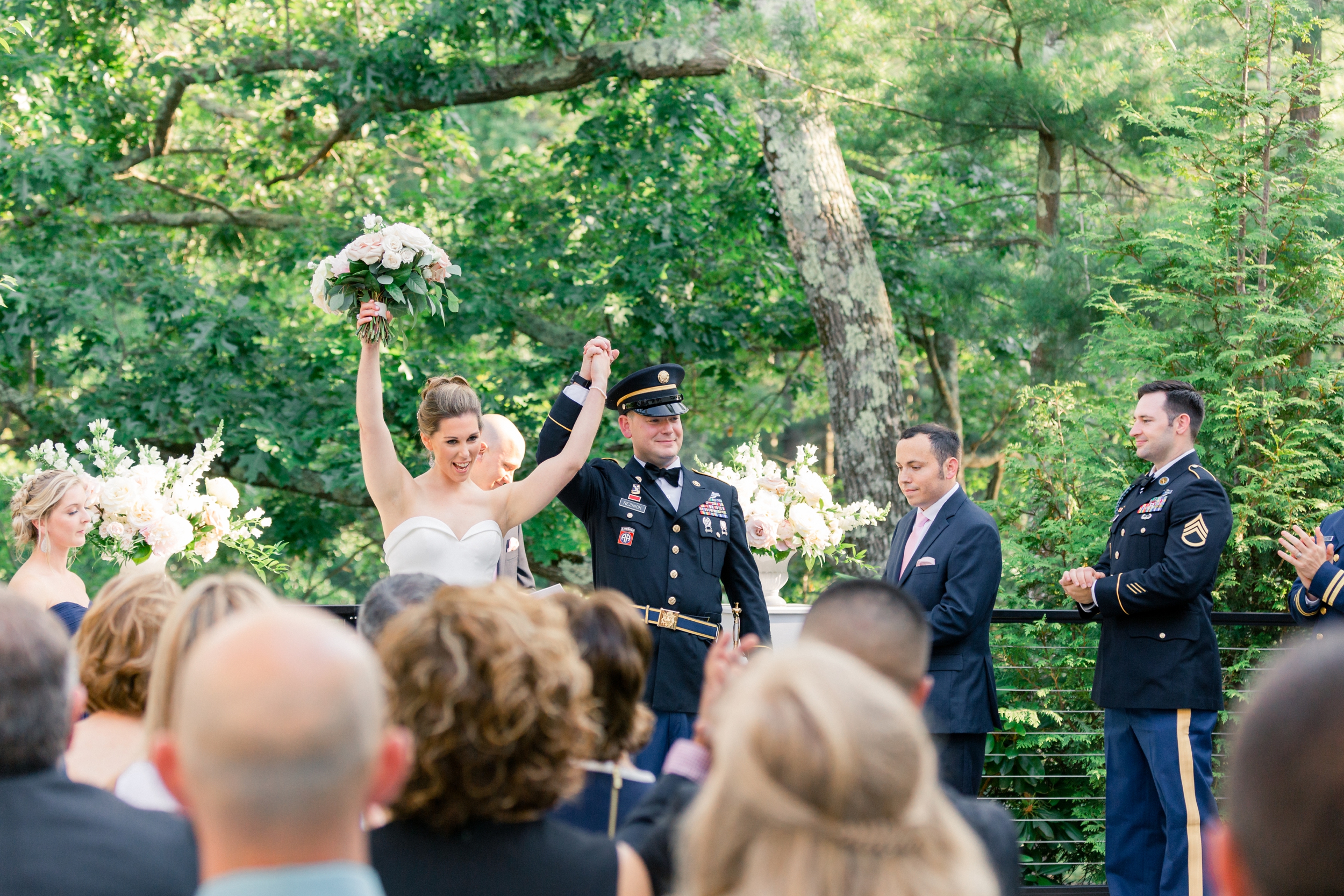 outdoor ceremony at Lakeview Pavilion newlyweds recess down the aisle