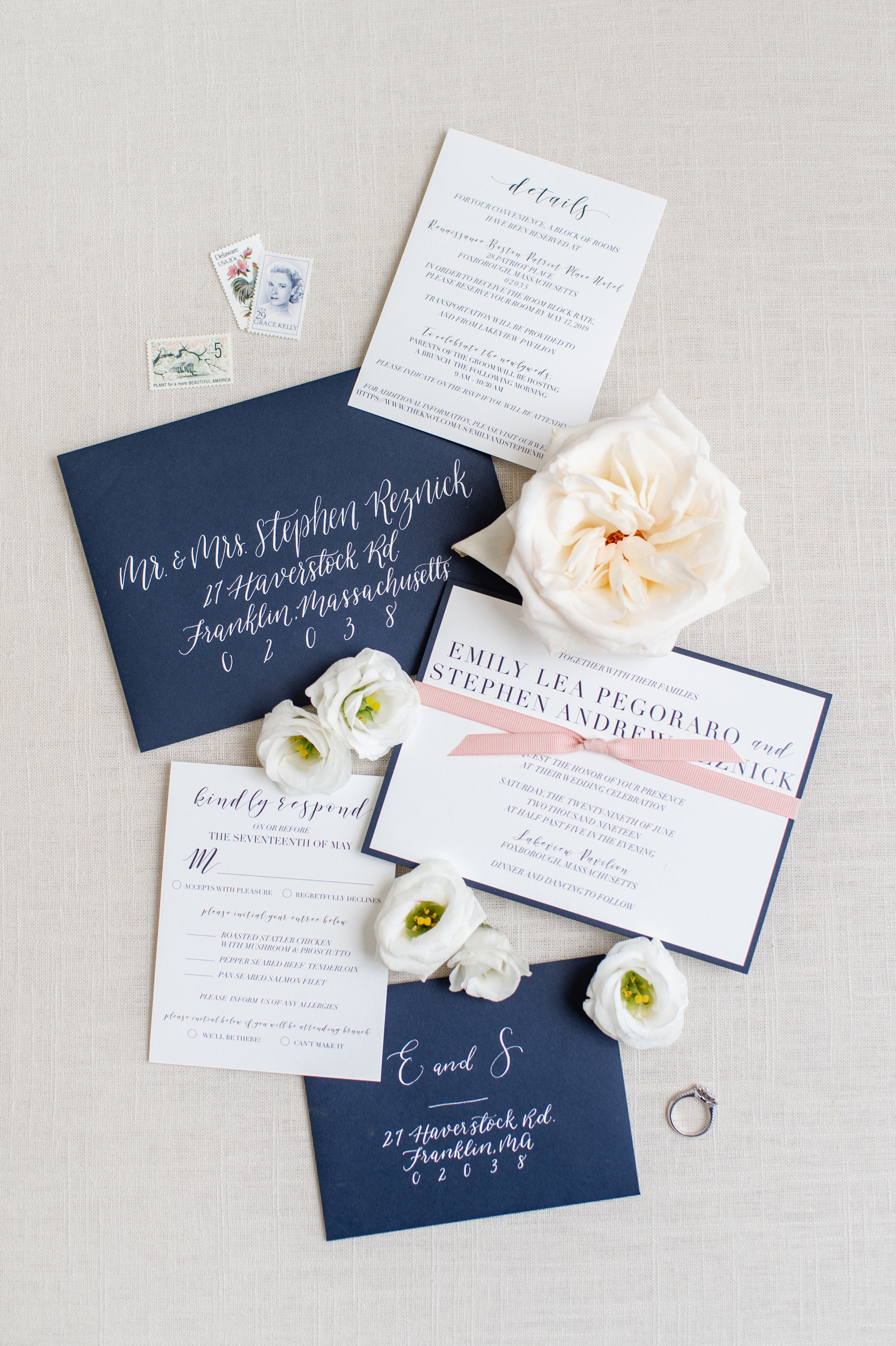 Lakeview Pavilion Wedding navy and blush invitation suite with calligraphy and ribbon styled bridal flat lay