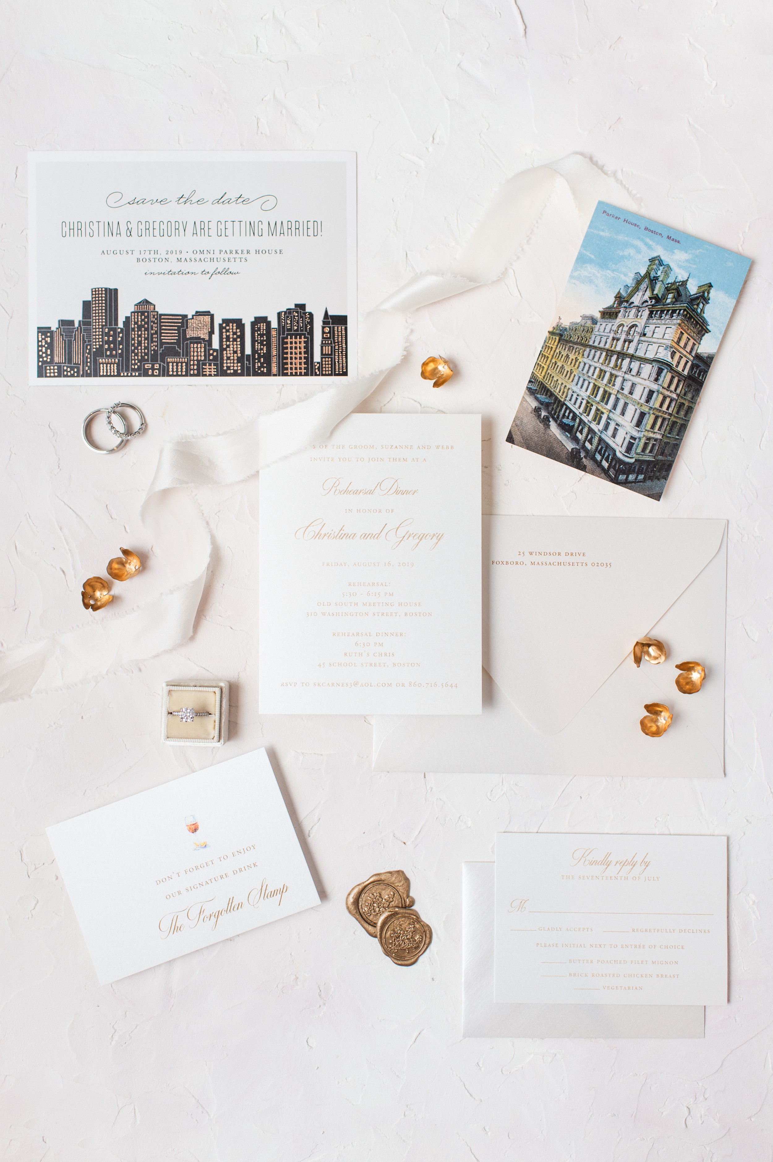 Omni Parker House Wedding Getting Ready styled invitation suite flat lay. Suite by Serif and Sans featuring boston skyline and vintage postcard