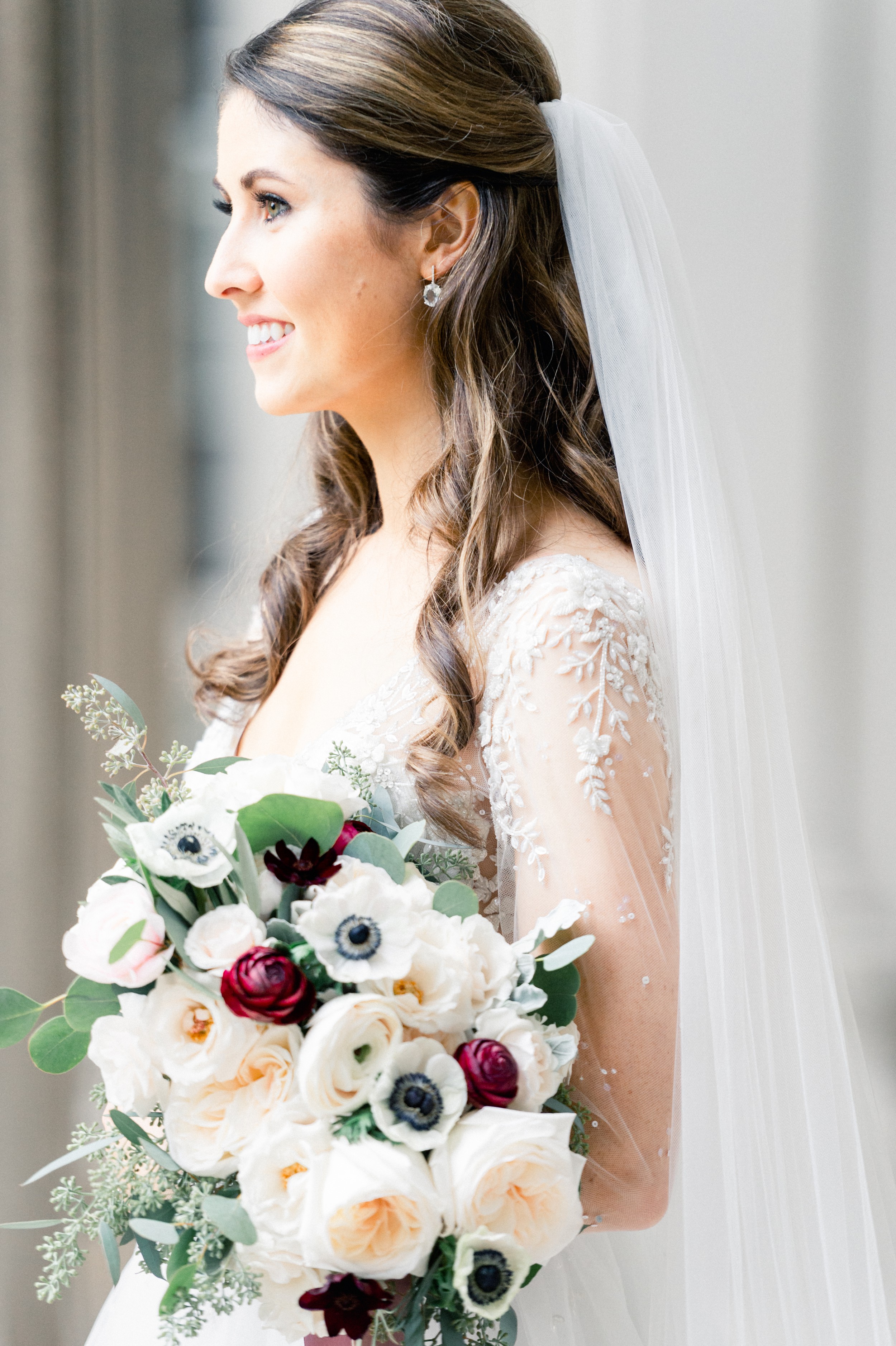 Stunning bride with Fall bouquet of blush and cream with pops of cranberry for Harvard Art Museum Wedding in Boston
