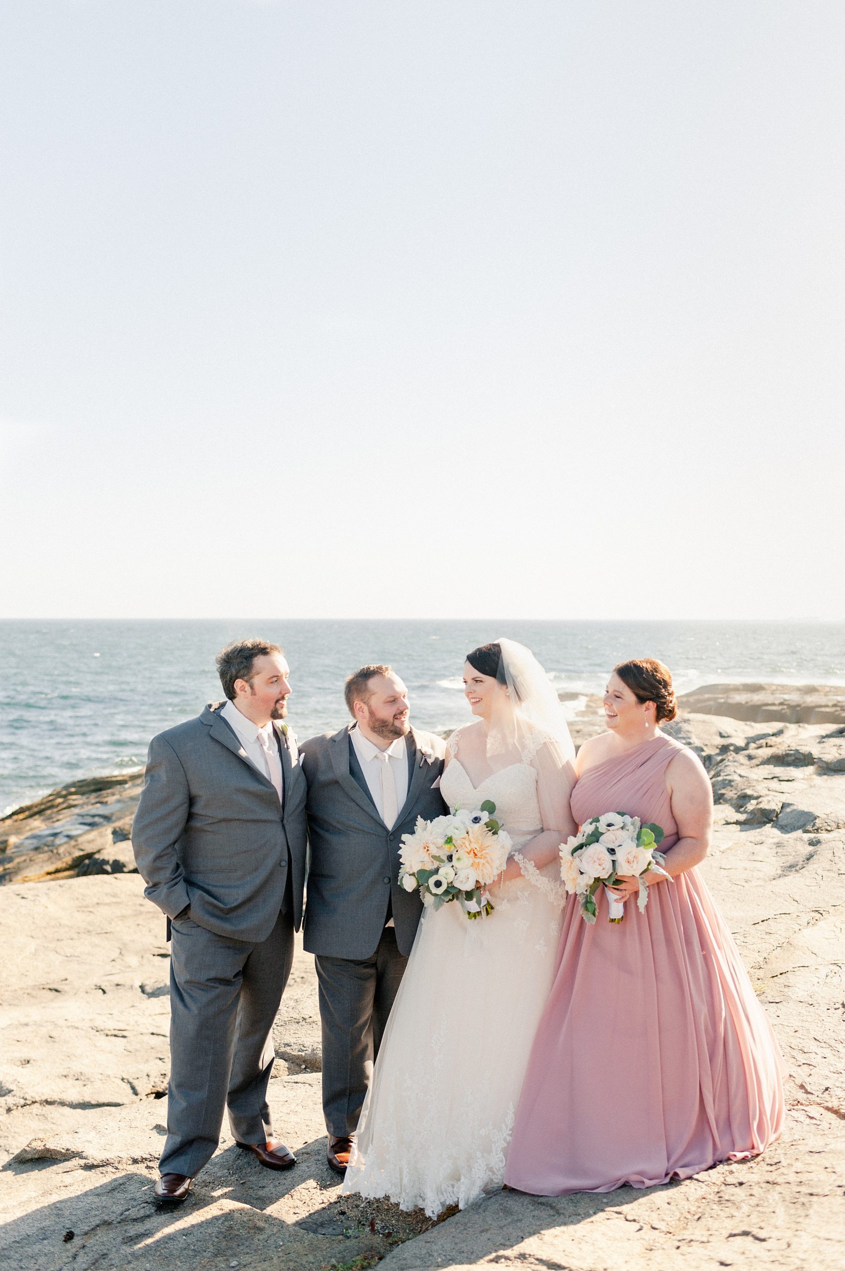 bridal party portraits at nubble lighthouse for york harbor inn wedding in maine