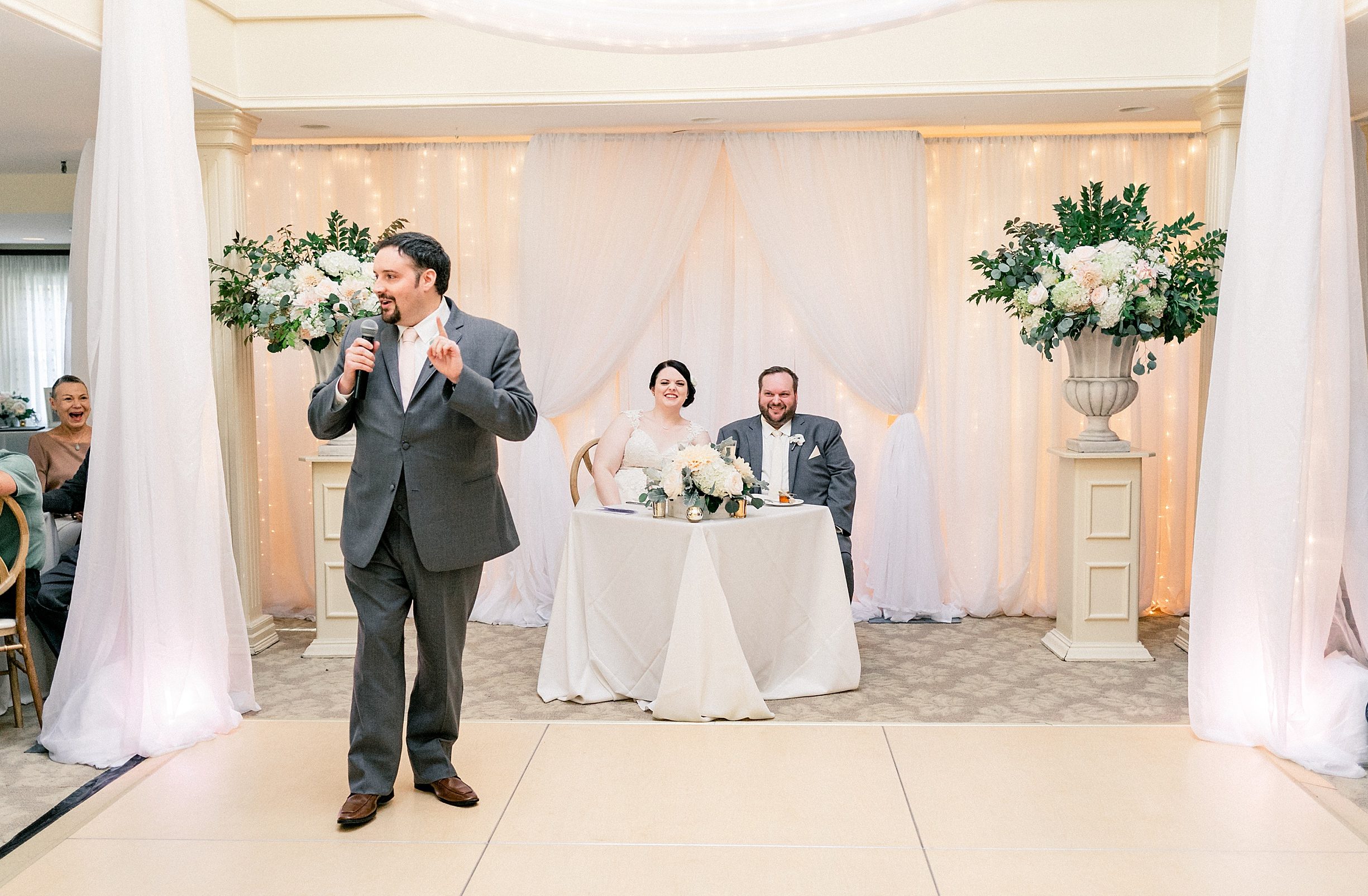 toasts to bride and groom at york harbor inn wedding