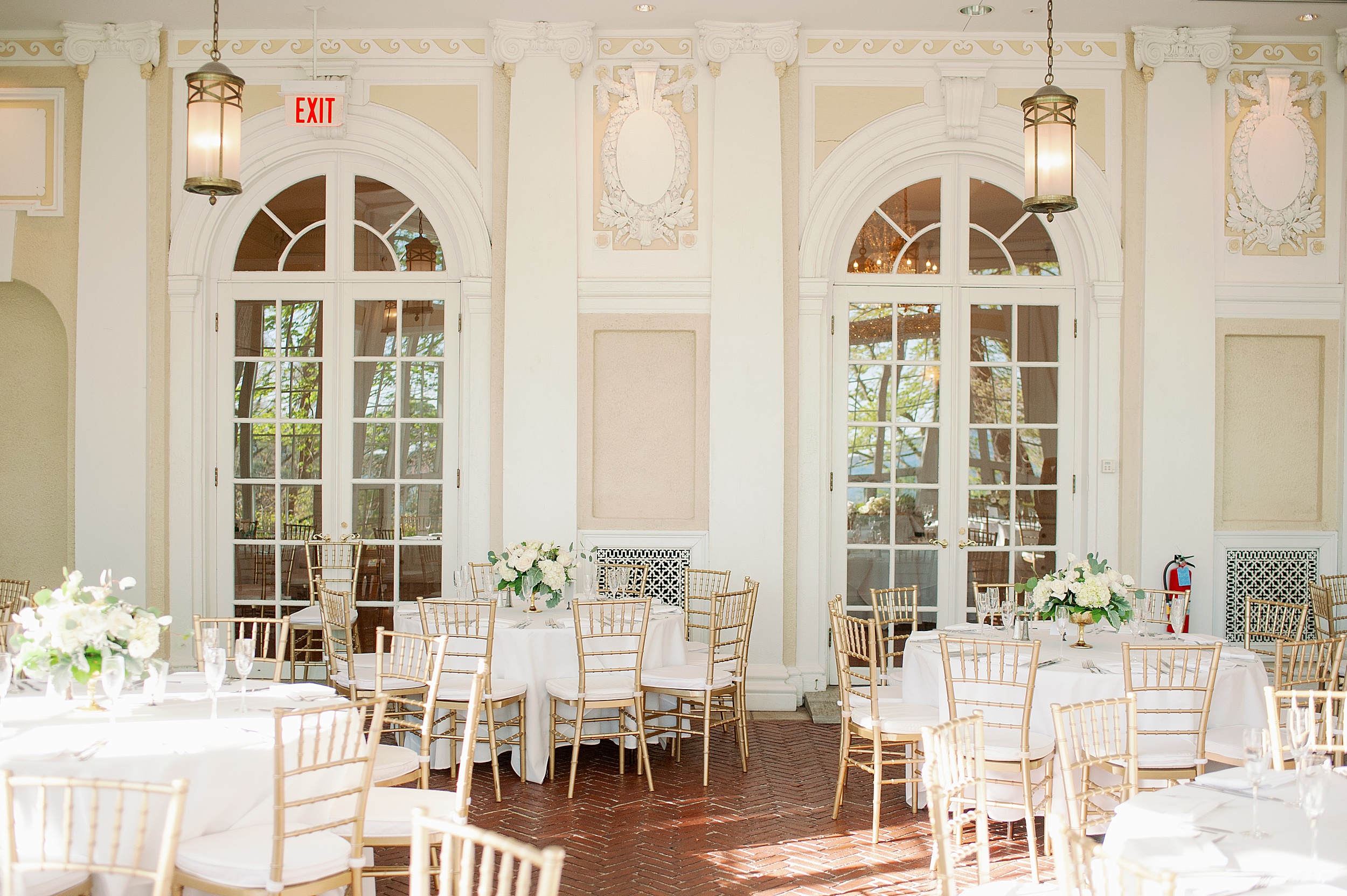Tupper Manor Conservatory wedding details white flowers and greenery