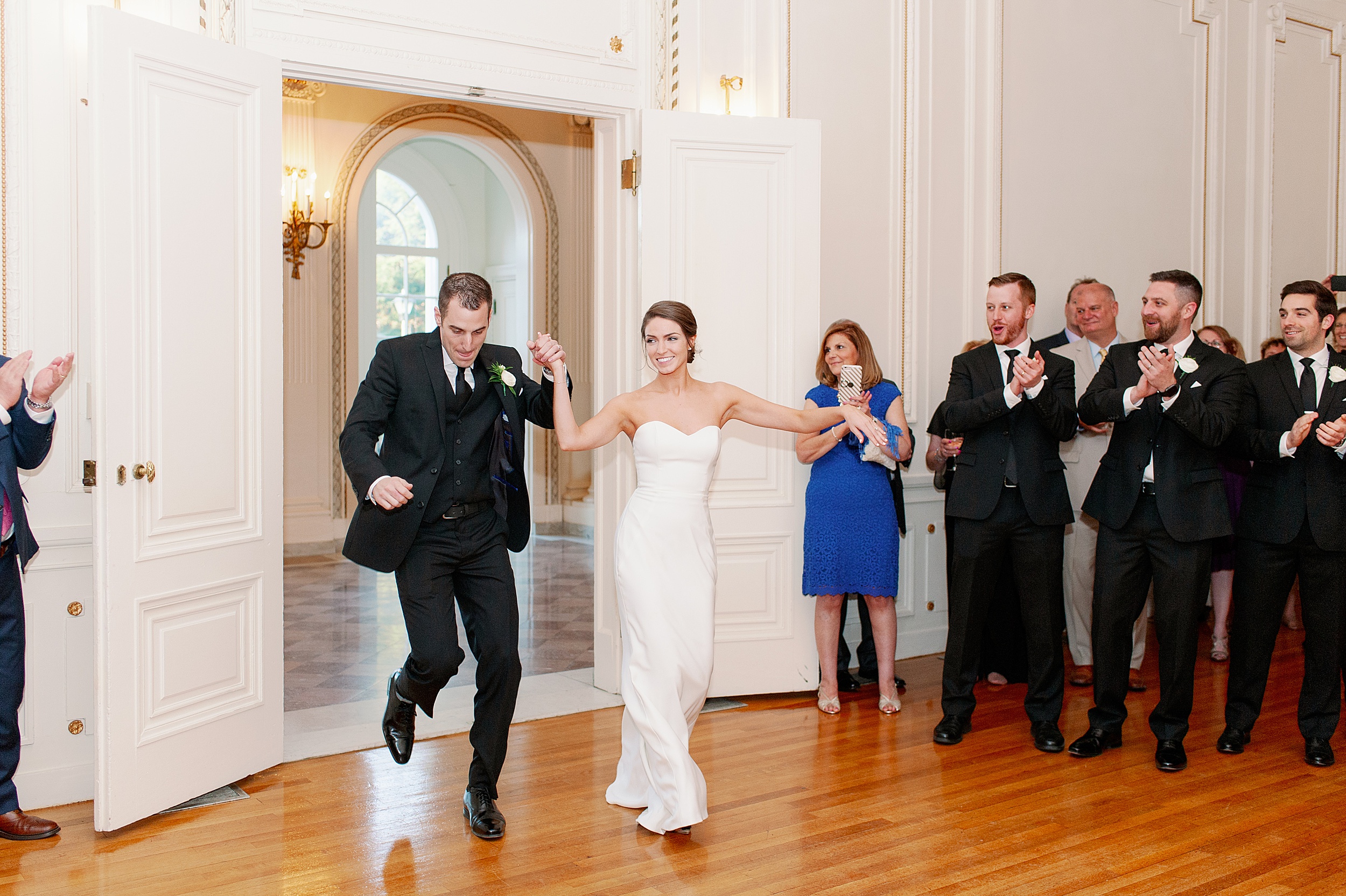 bride and groom enter reception for first dance at Tupper Manor in Beverly MA