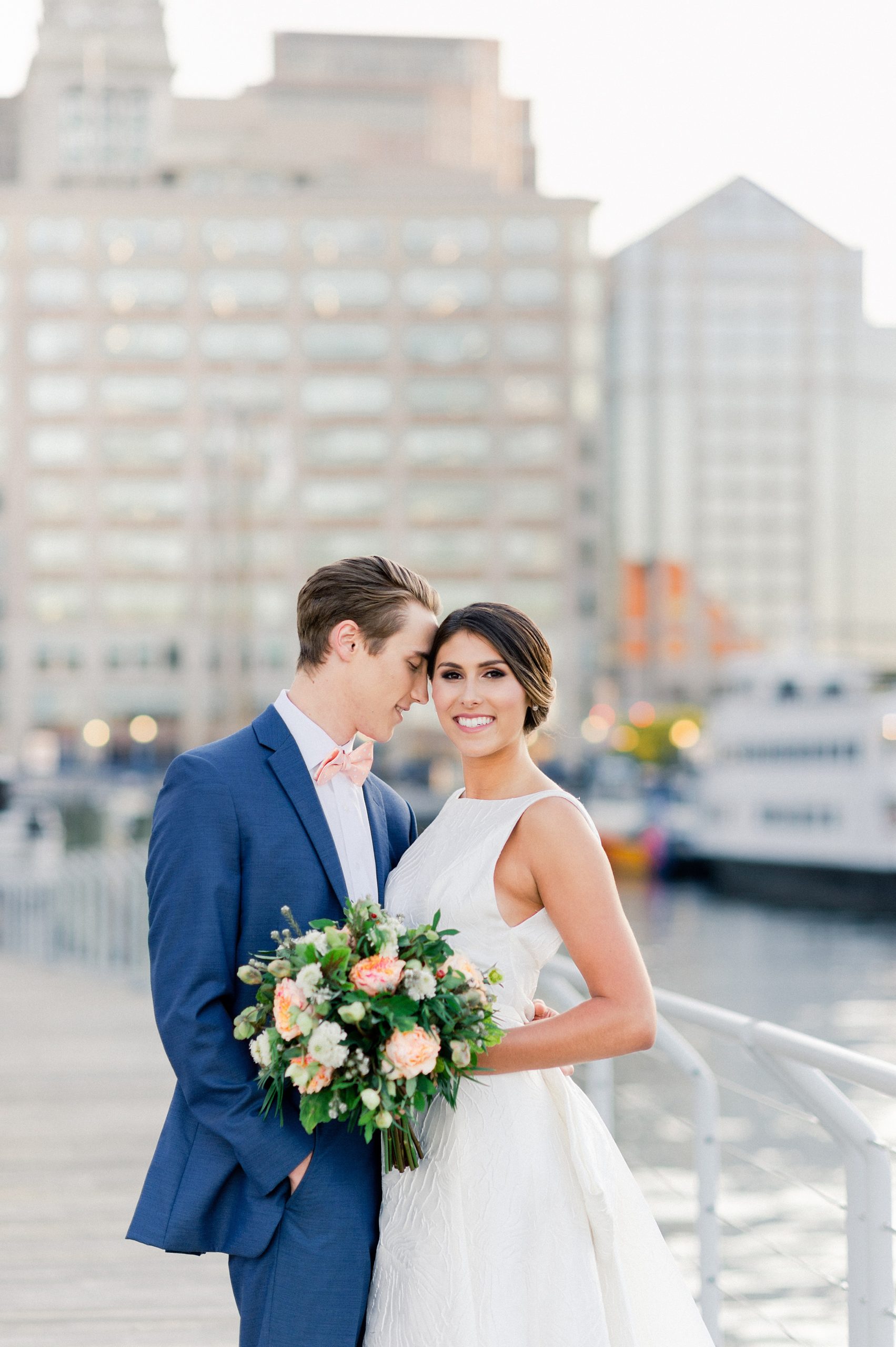 New England Aquarirum wedding inspiration bride and groom preppy chich couple with modern flair in Boston on the water