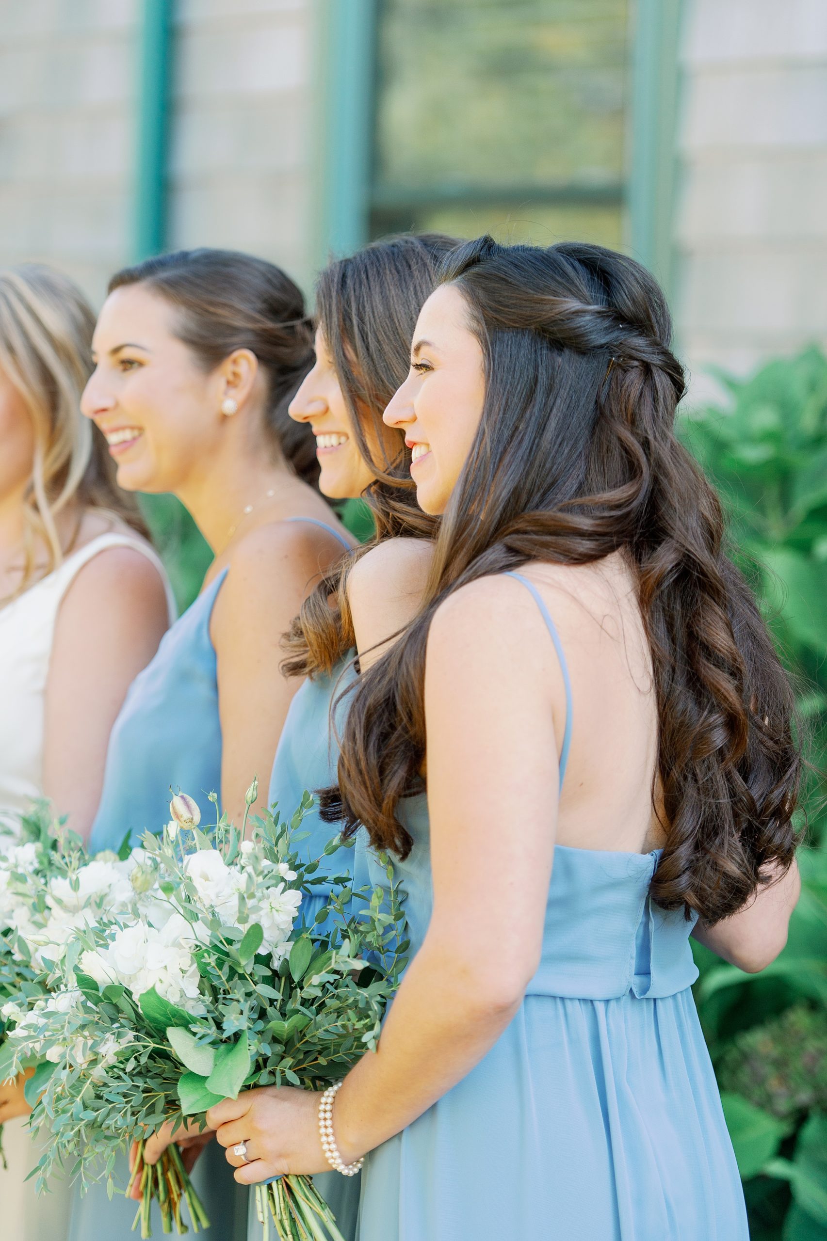 bridemaids hairstyle and pale blue dresses