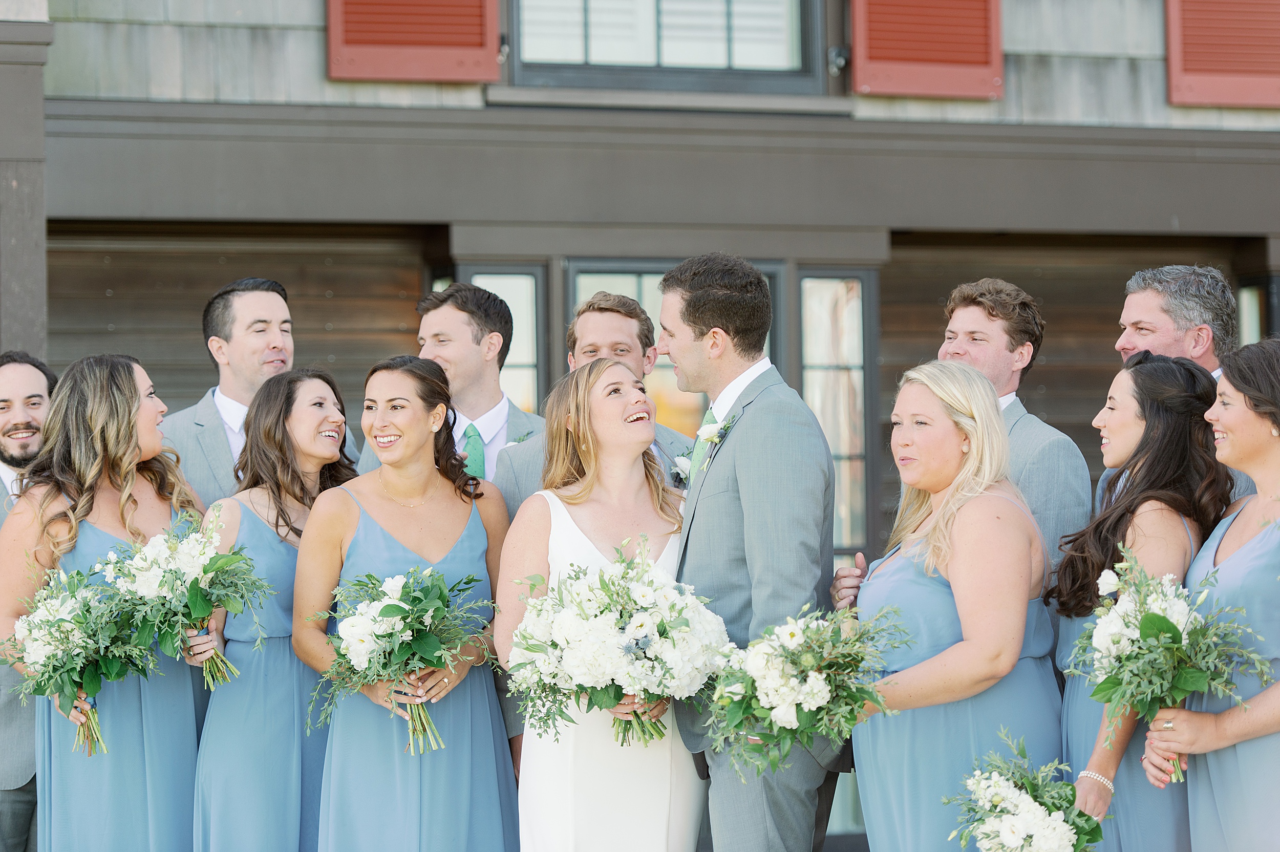 wedding party portraits in pale blue dresses and gray suits