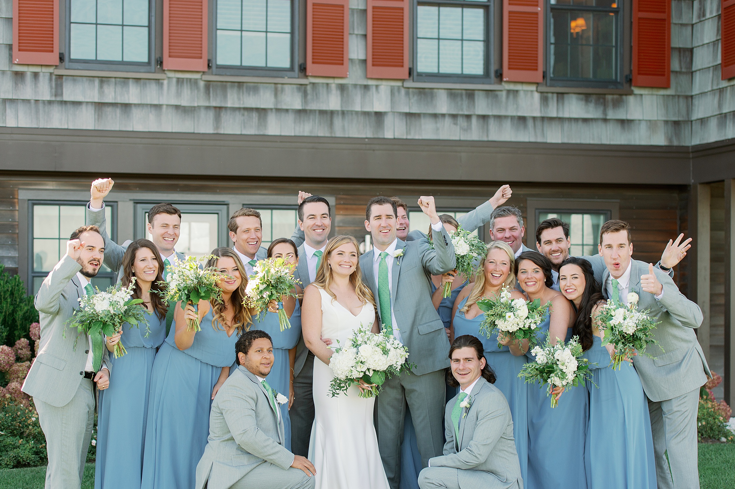 wedding party portraits in pale blue dresses and gray suits at Weekapaug Inn Wedding