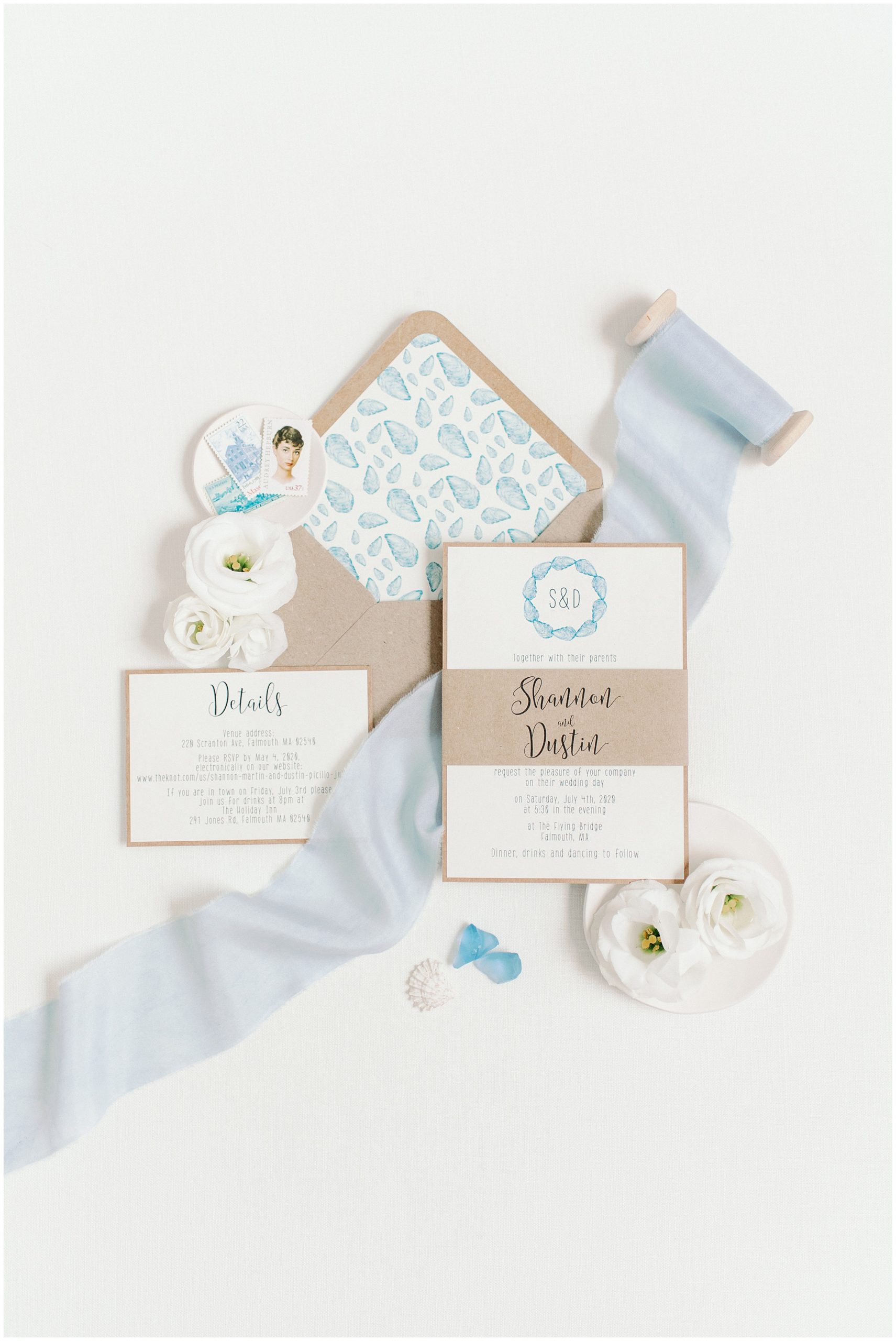 pale blue invitation with muscle shells for cape cod micro wedding