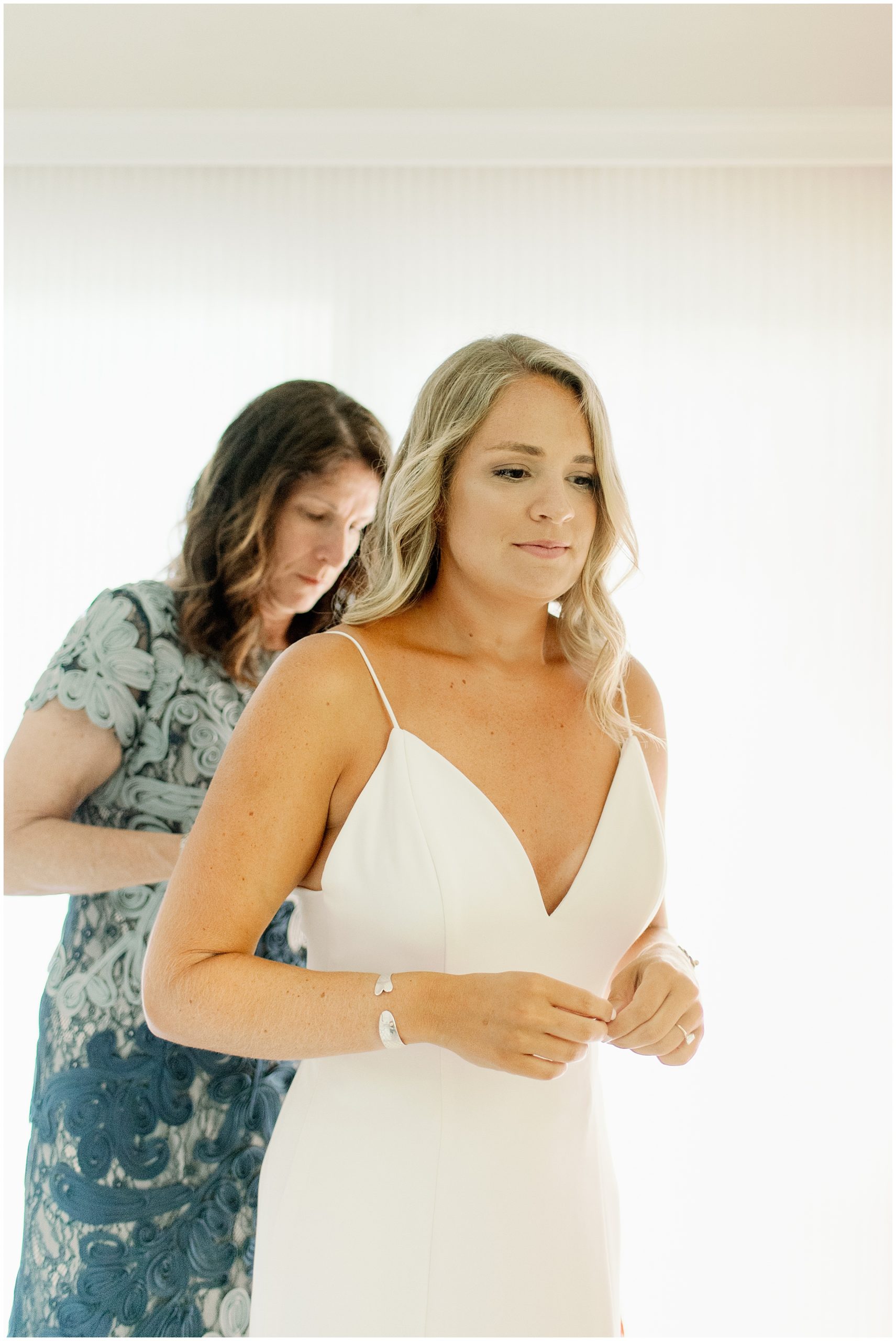 bride getting ready for her Cape Cod Micro Wedding