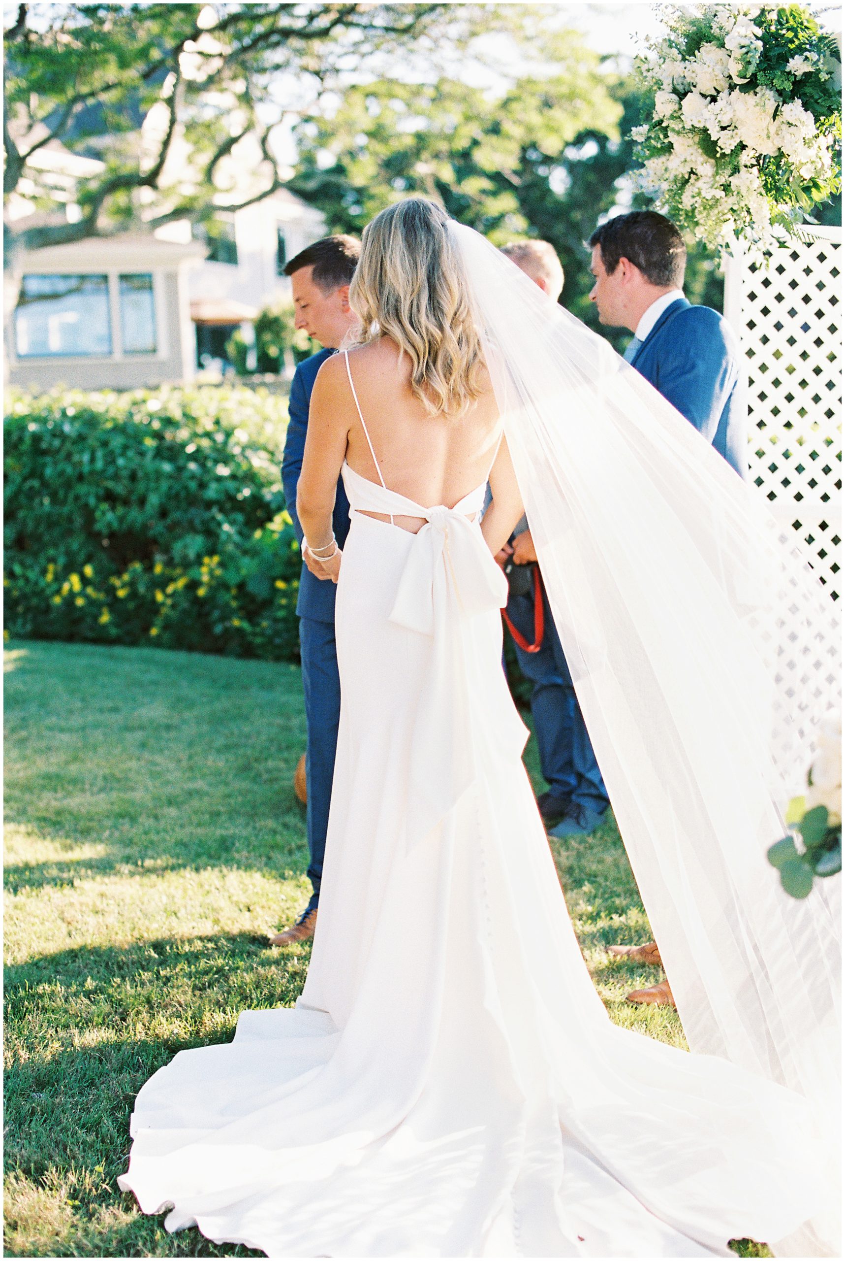 stunning bridal gown with low back and bow