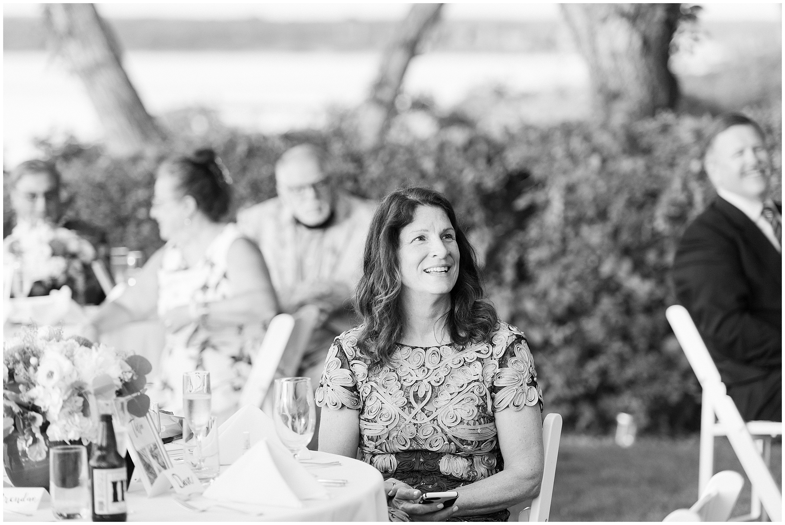 black and white outdoor wedding reception guest portrait