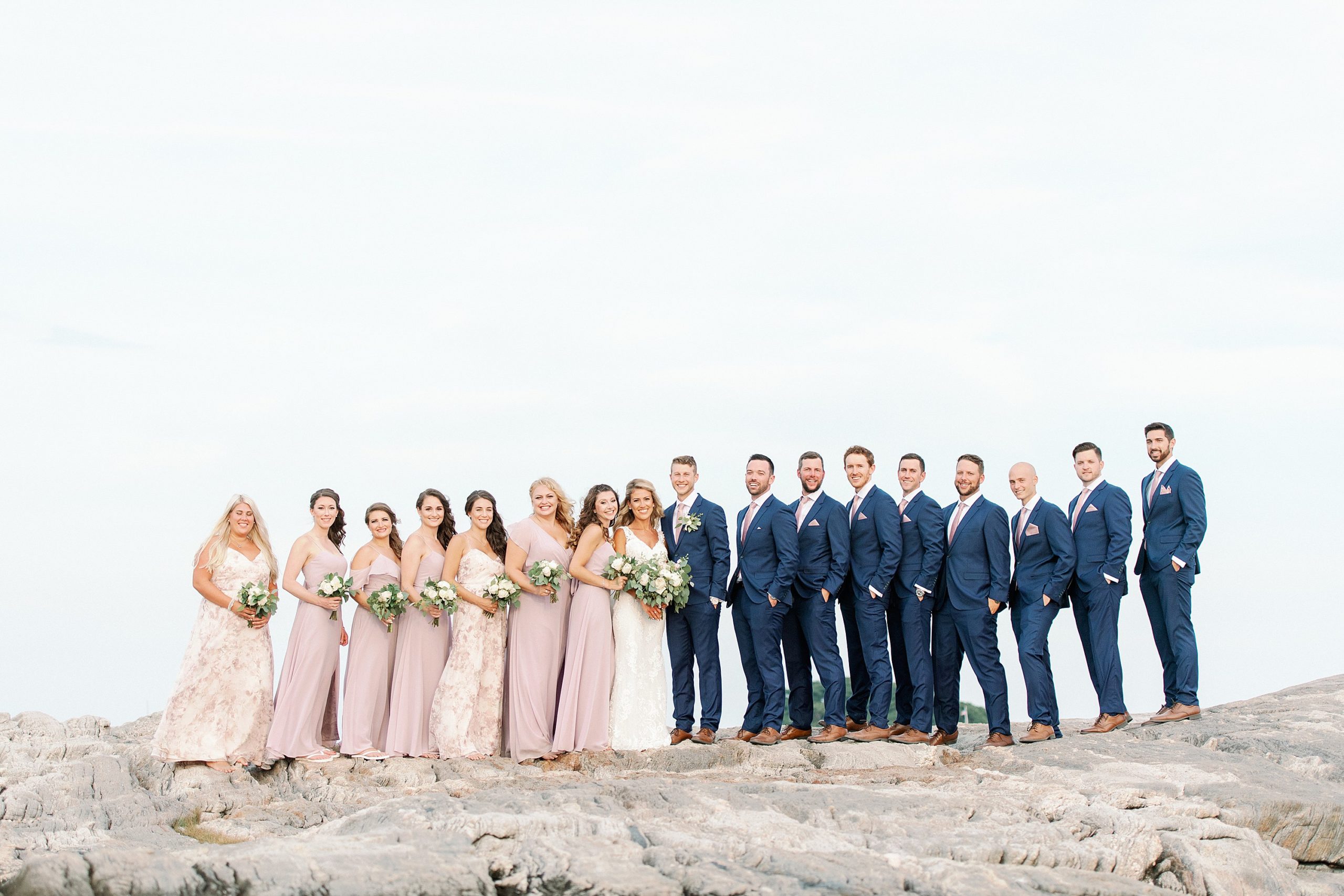 wedding party photos on the jetty at madison beach hotel