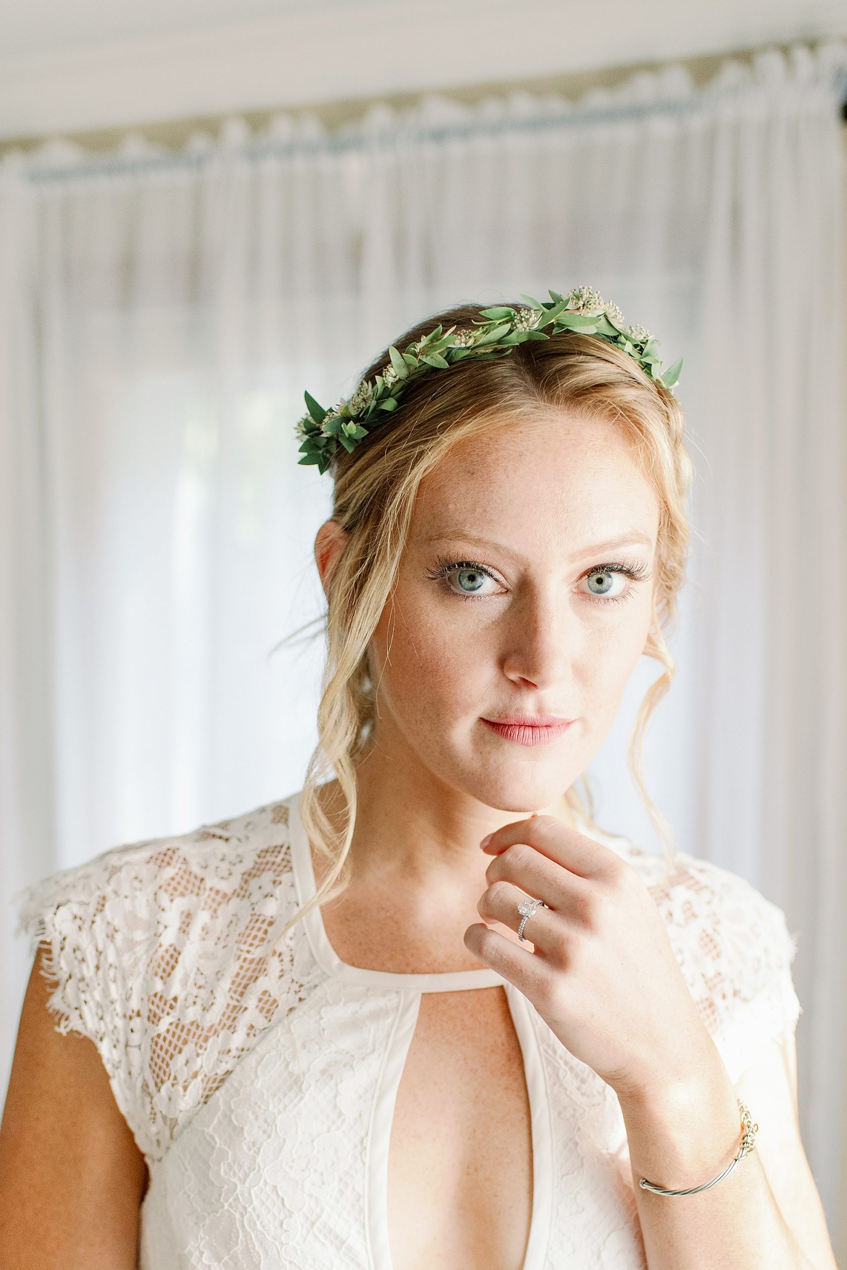 bridal portrait of Lauren with flower crown and lace wedding dress 