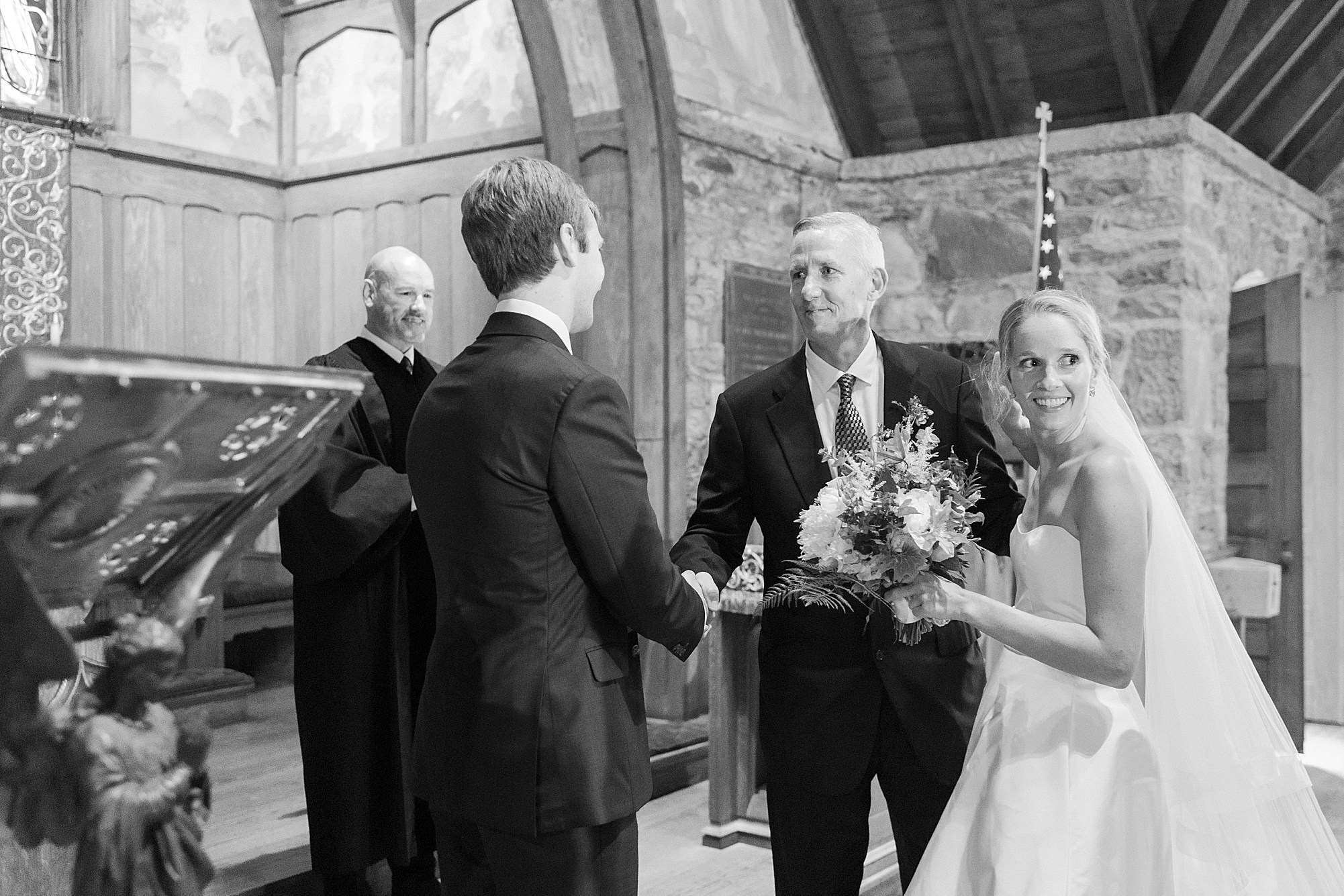 Catskills wedding ceremony at small stone church black and white