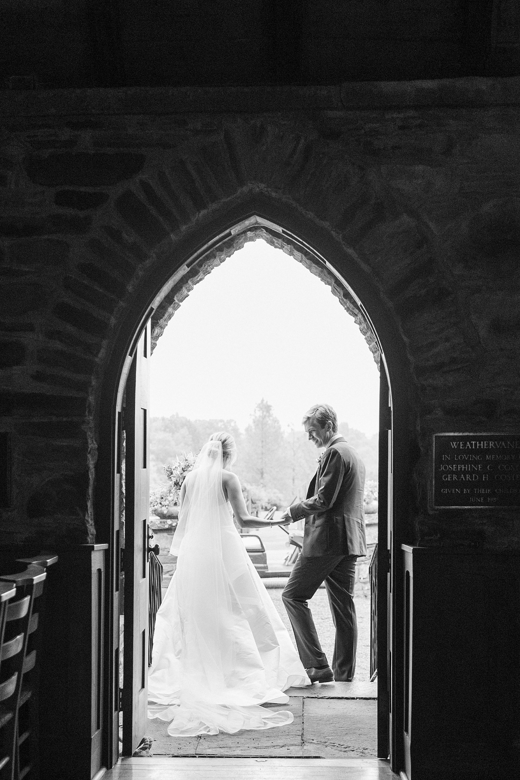 Catskills wedding ceremony at small stone church black and white
