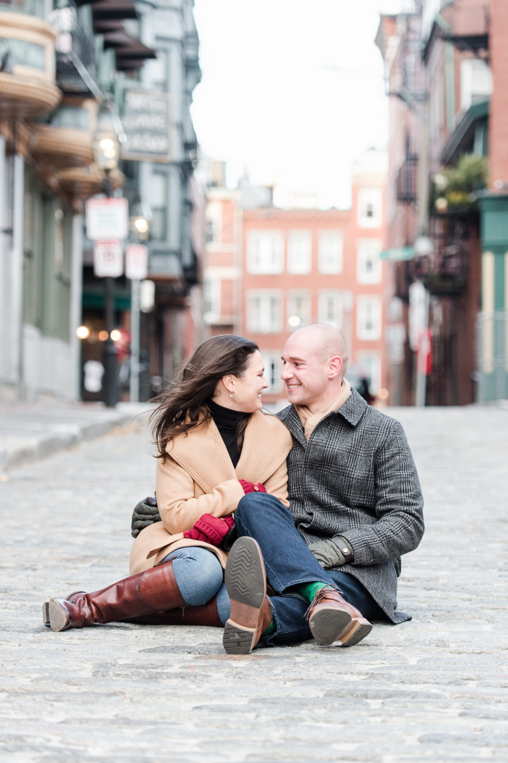 winter engagement session tips for north end engagement with warm coats and bright mittens