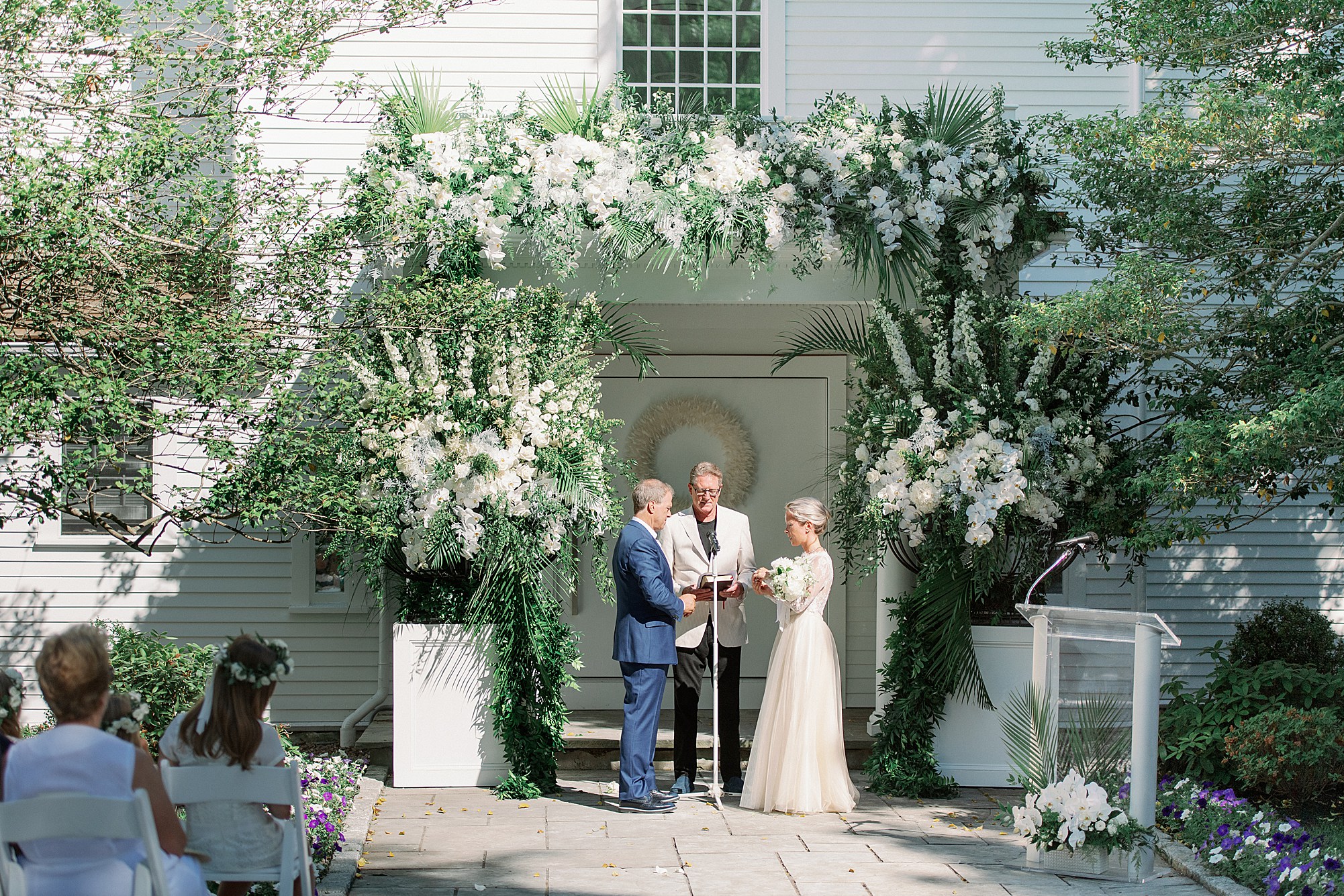 At Home Cape Cod Wedding Ceremony with incredible florals