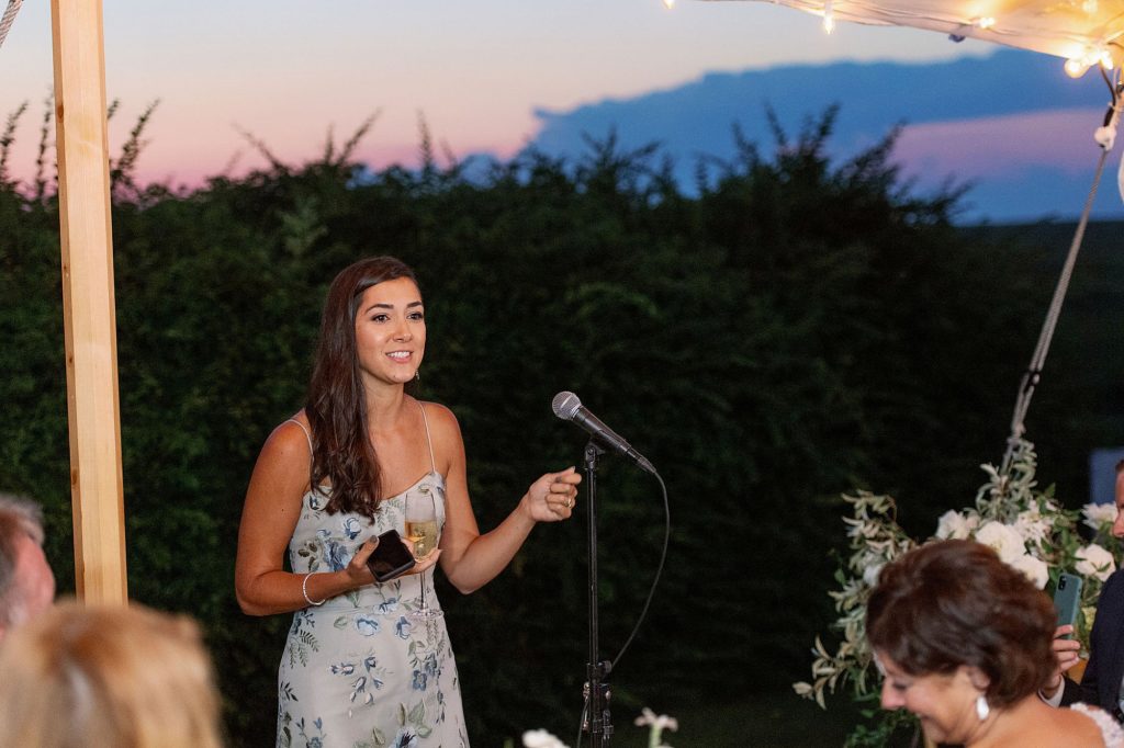 maid of honor speech under tiny sperry tent at micro wedding