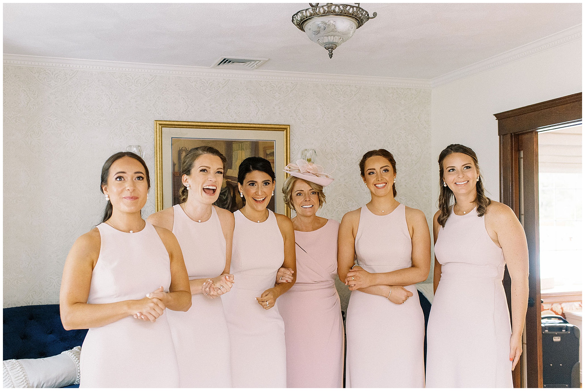 bridesmaid reveal of bride after getting into dress