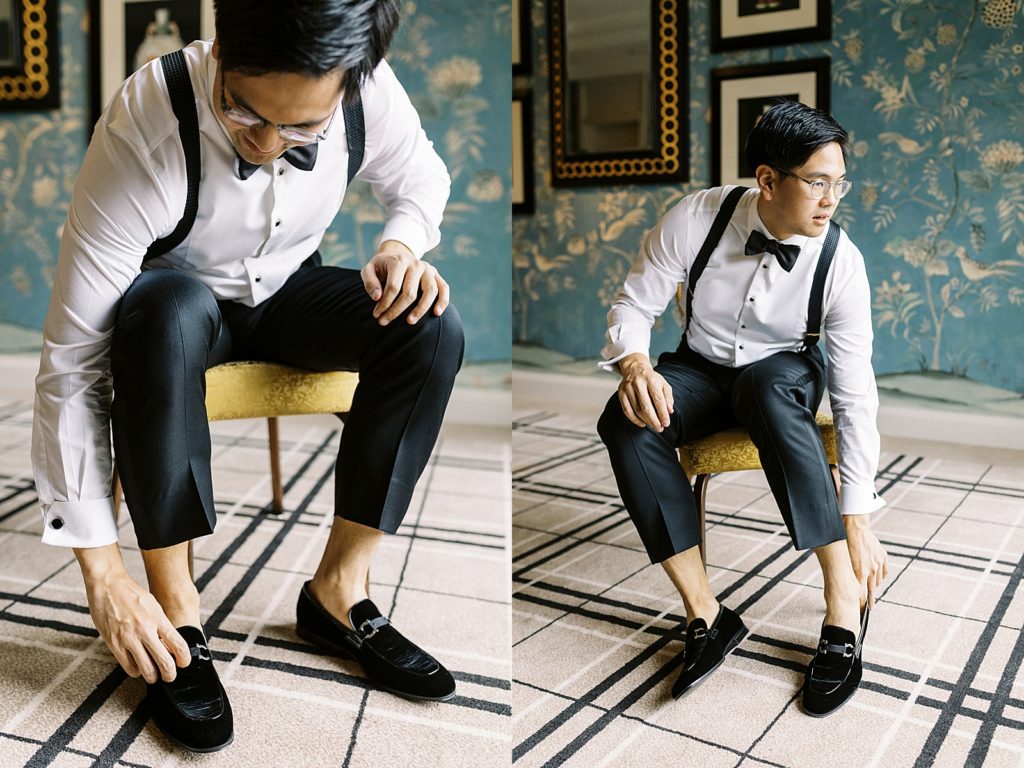 Groom putting on his shoes before his Boston wedding by photographer Lynne Reznick.