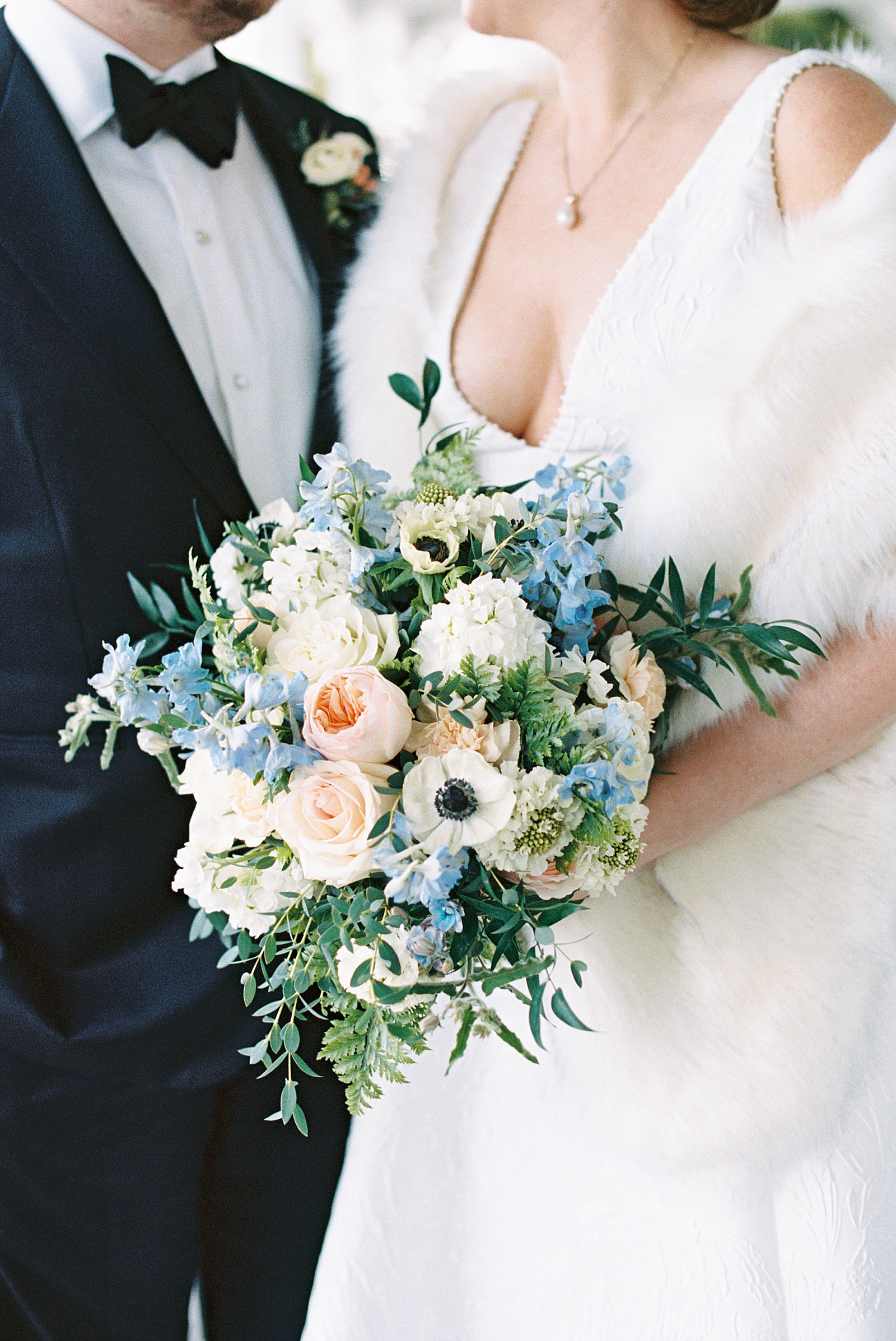 Bridal flowers with cream, peach and blue accents by New York Photographer Lynne Reznick 