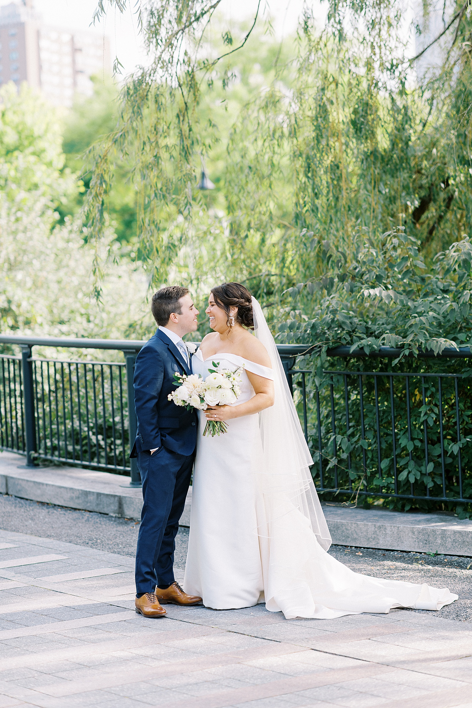 wedding couple embracing in a New York Park before their wedding