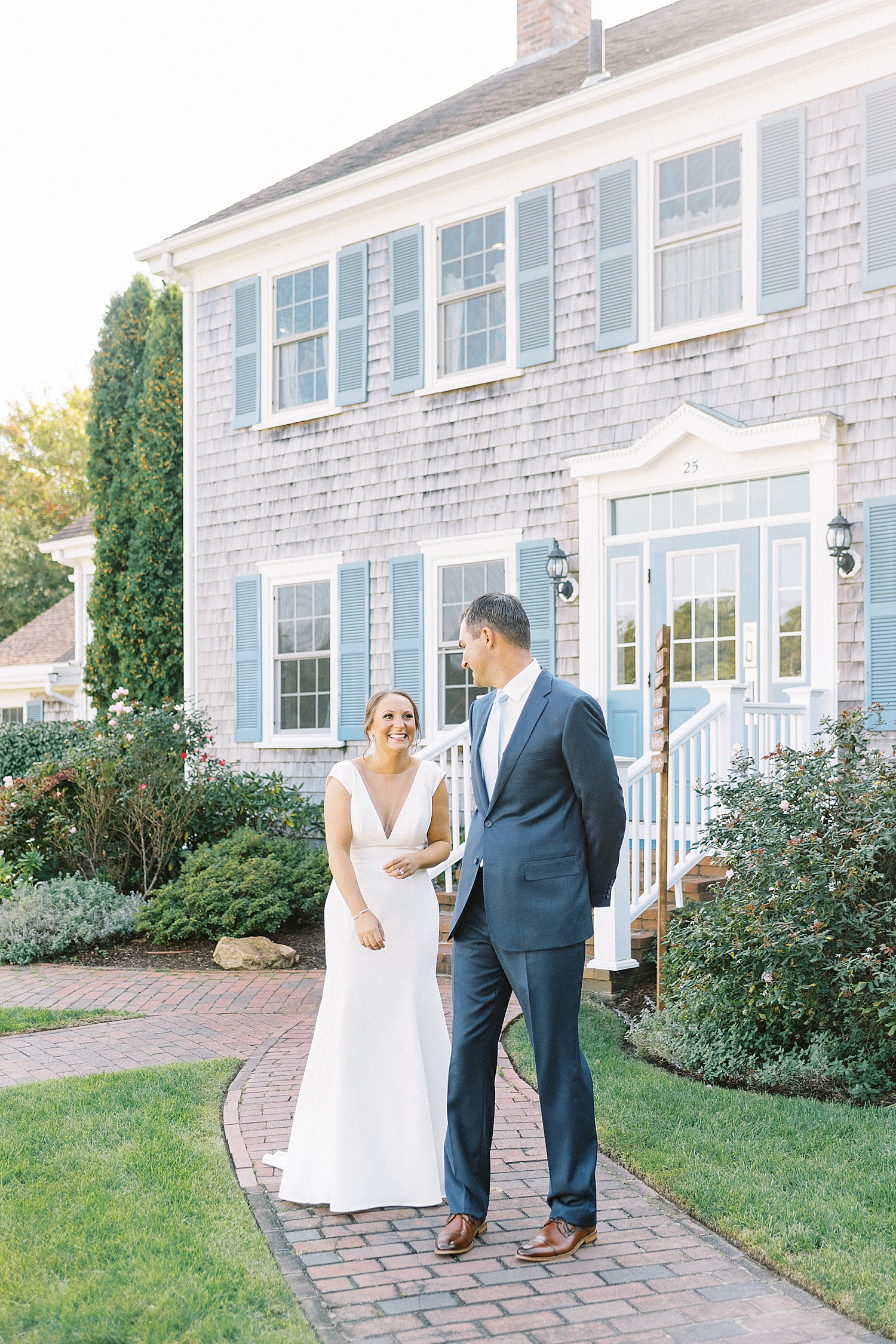 Groom sees bride during first look by Cape Cod wedding photographer Lynne Reznick