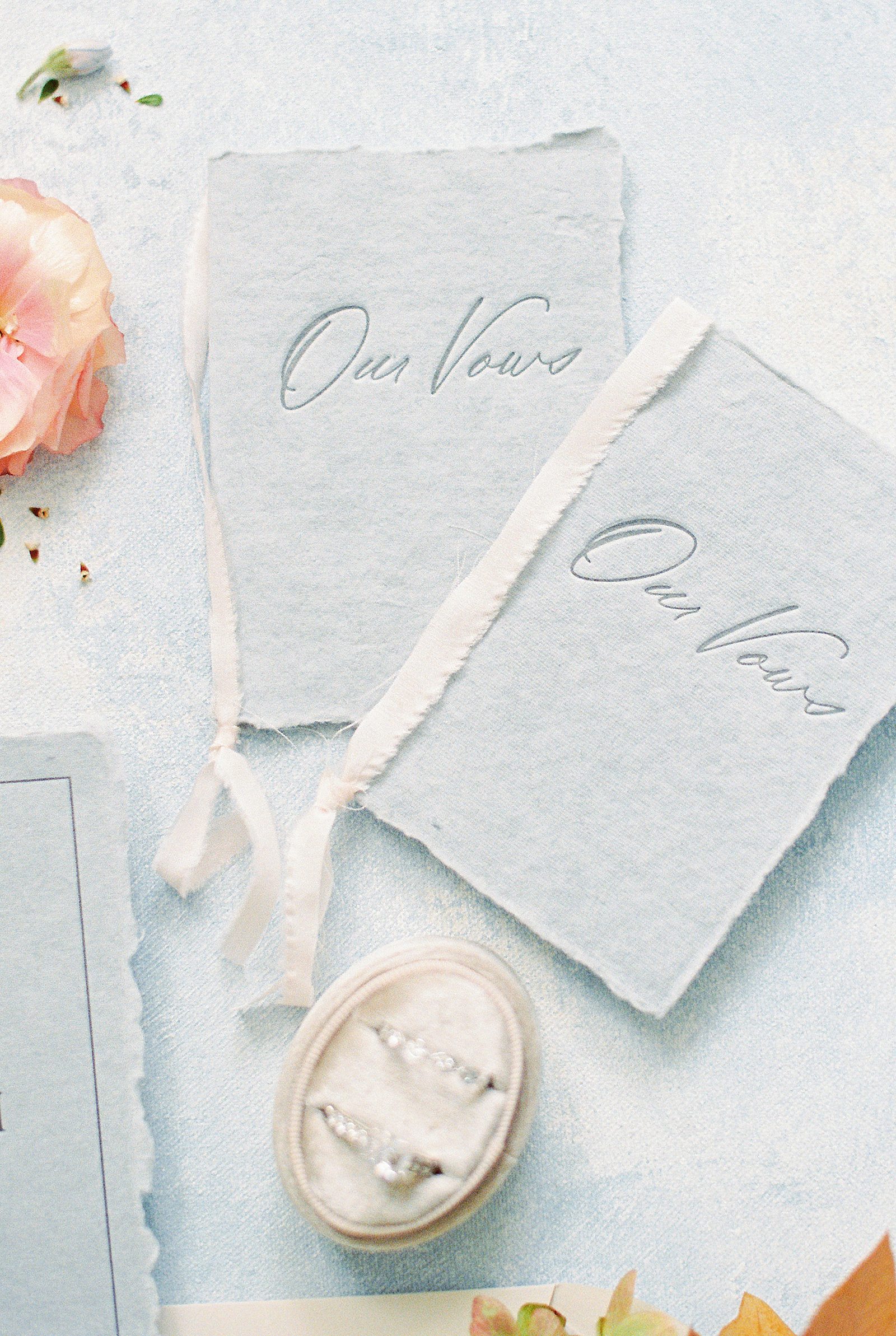 Two blue vow books by Massachusetts wedding photographer 