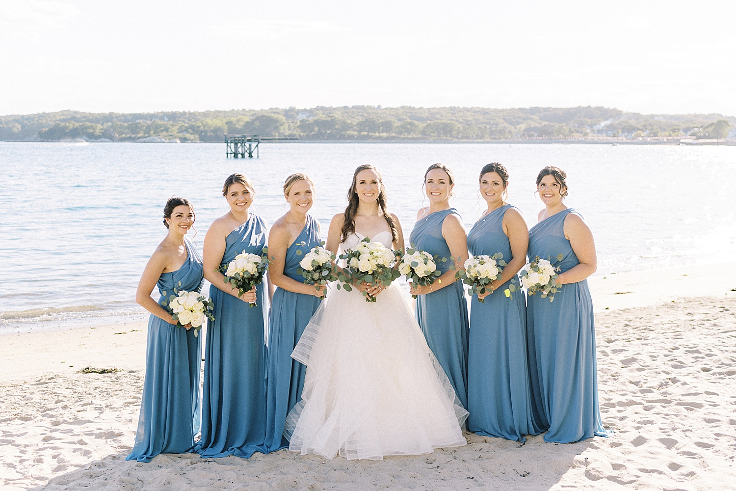 Bride with bridesmaids in blue at Beauport Hotel