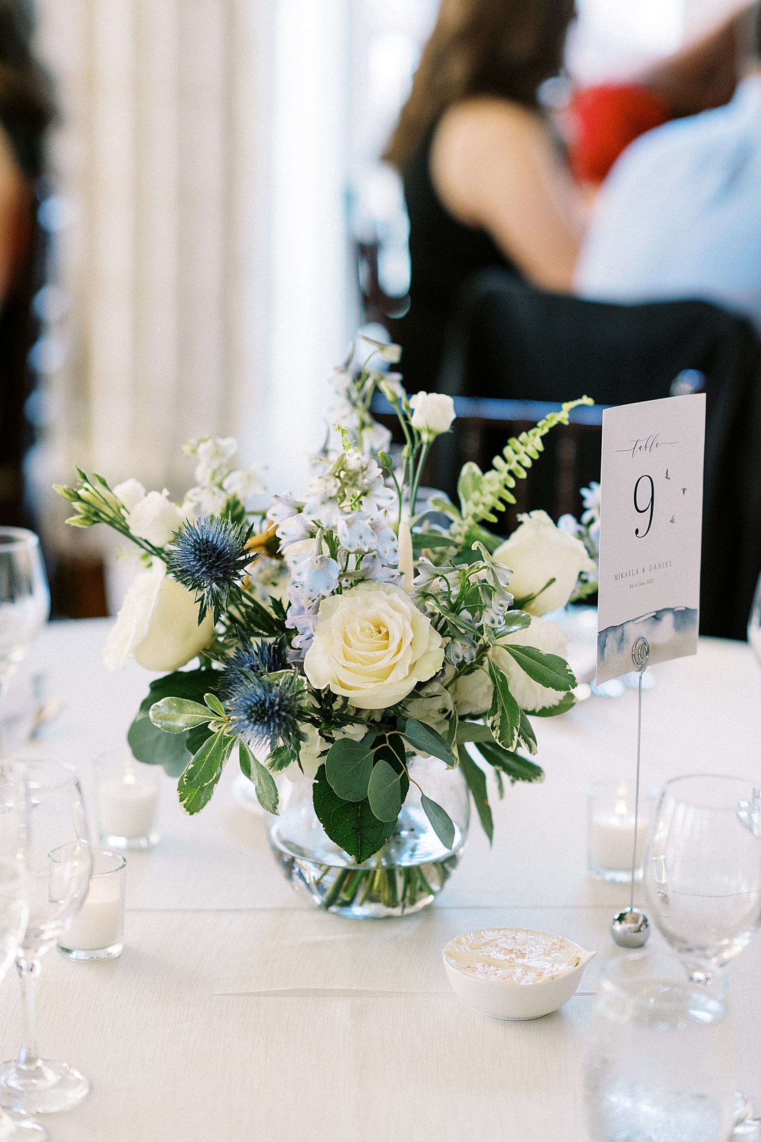 Flowers on reception table by Massachusetts wedding photographer