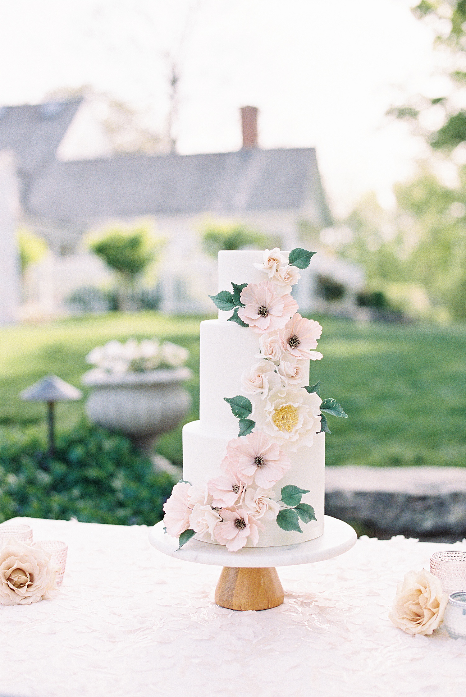 Three tiered cake with flowers for dat at Smith Farm Gardens