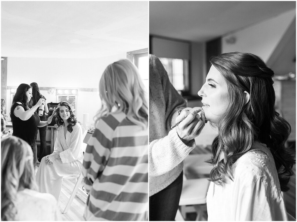 black and white of bride getting hair and makeup done