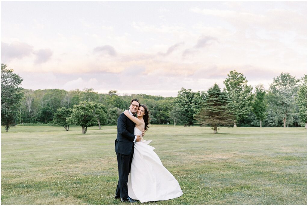 sunset skies and happy couple at catskills mountains wedding