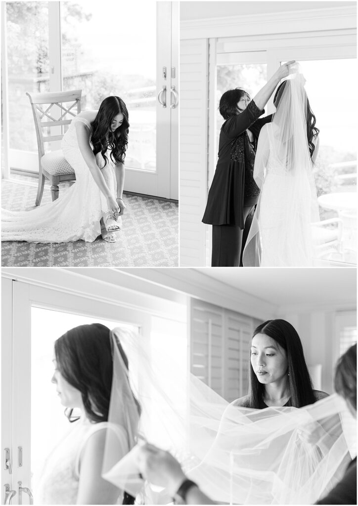 black and whote images of bride getting into dress and shoes with help from mom and sister