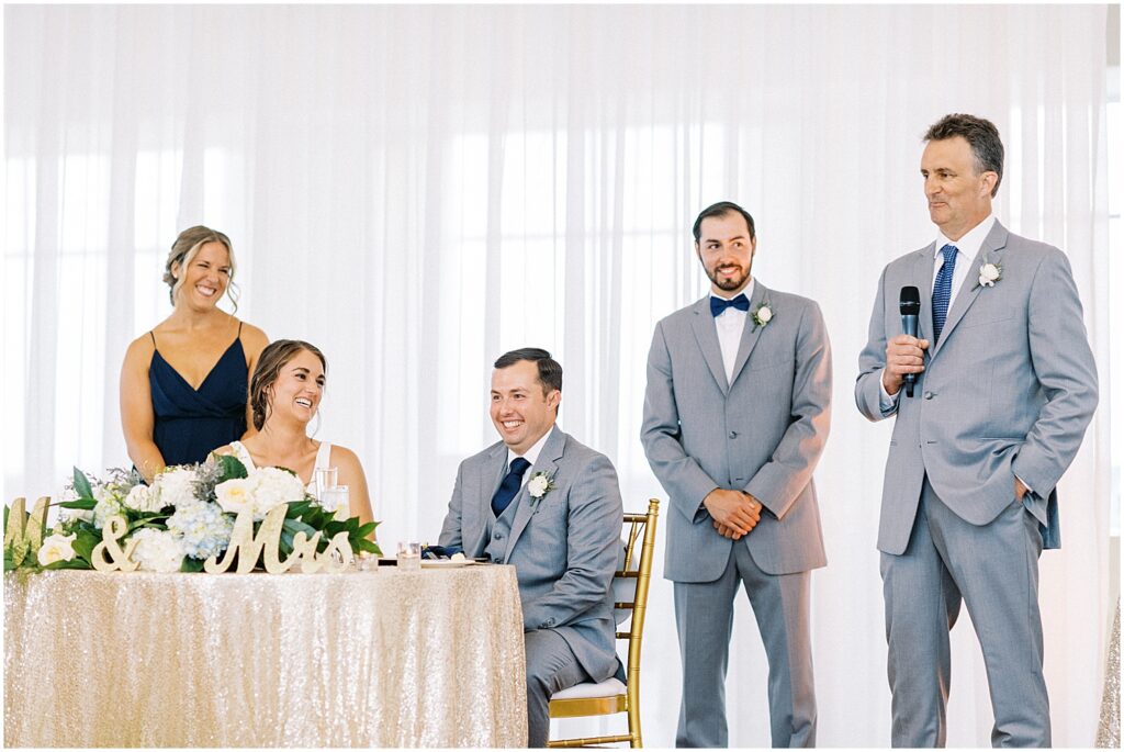father of the bride gives toast at wedding on the east coast
