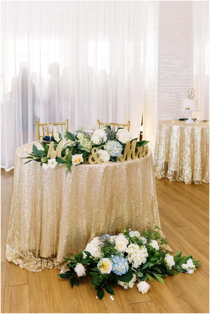 sweetheart table in gold linen for newport wedding