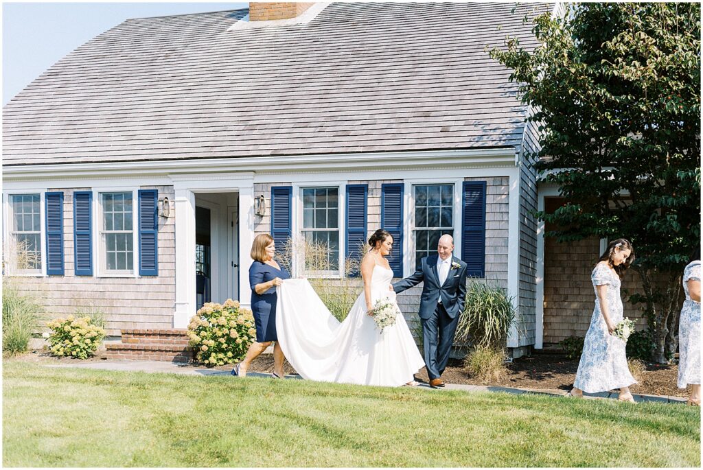 Bride heads to first look outside Chatham MA home 