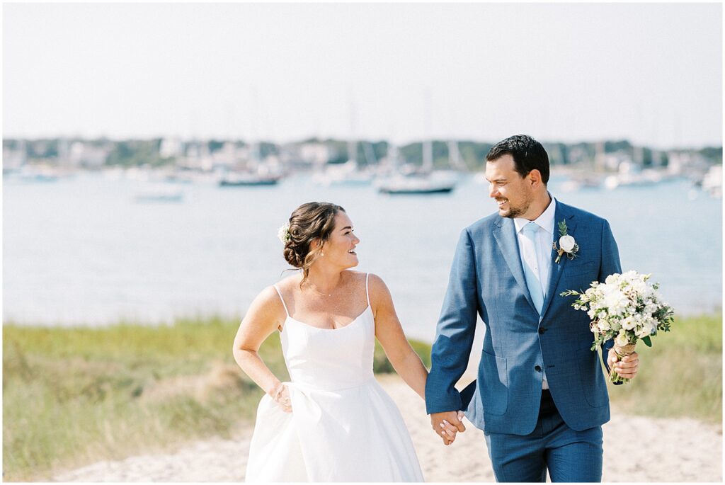 couple walking together during Cape Cod wedding weekend