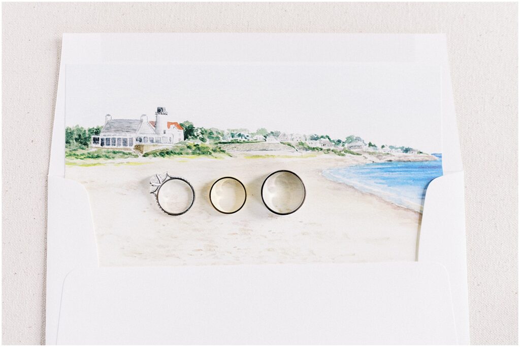 couples rings on invitation illustration for cape cod wedding weekend