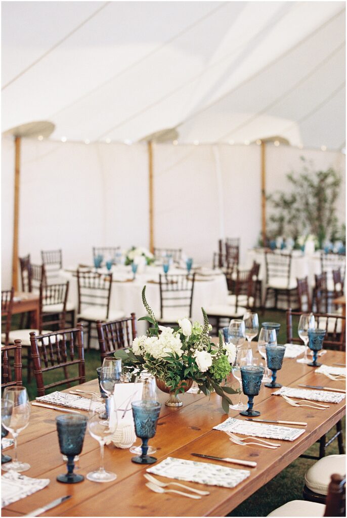 tented wedding reception setup at Chatham Beach and Tennis Club