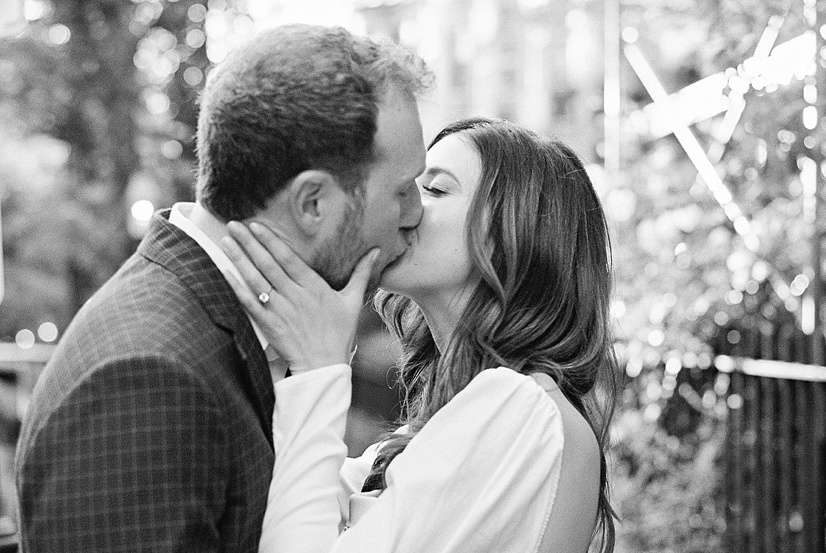 Engaged couple kissing for photos with a Boston Wedding Photographer