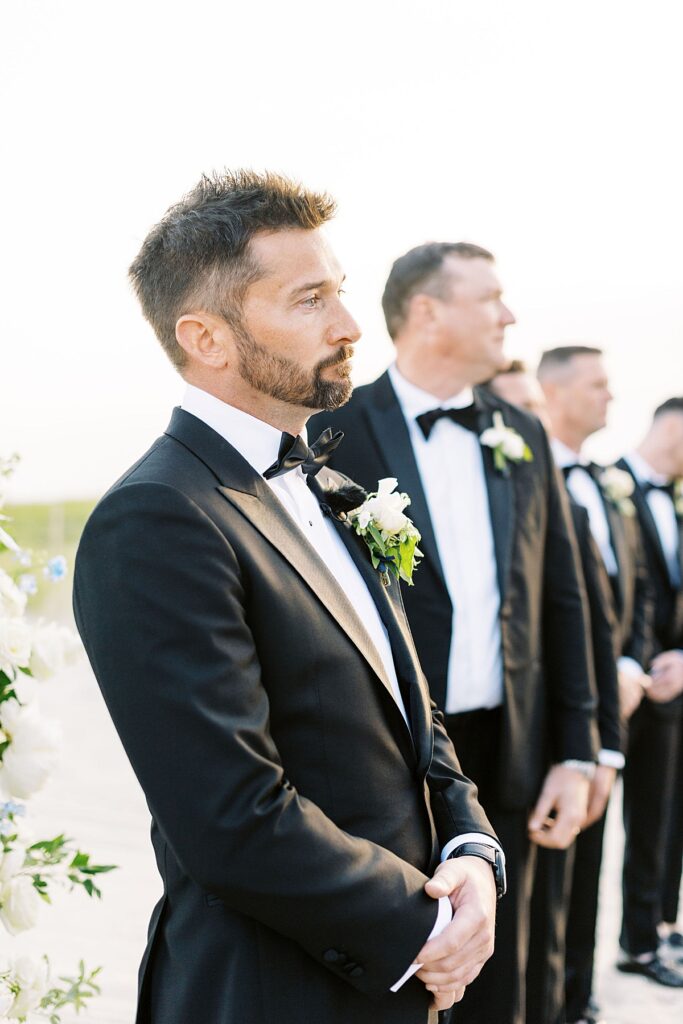 groom looking at bride captured by Cape Cod Wedding Photographer