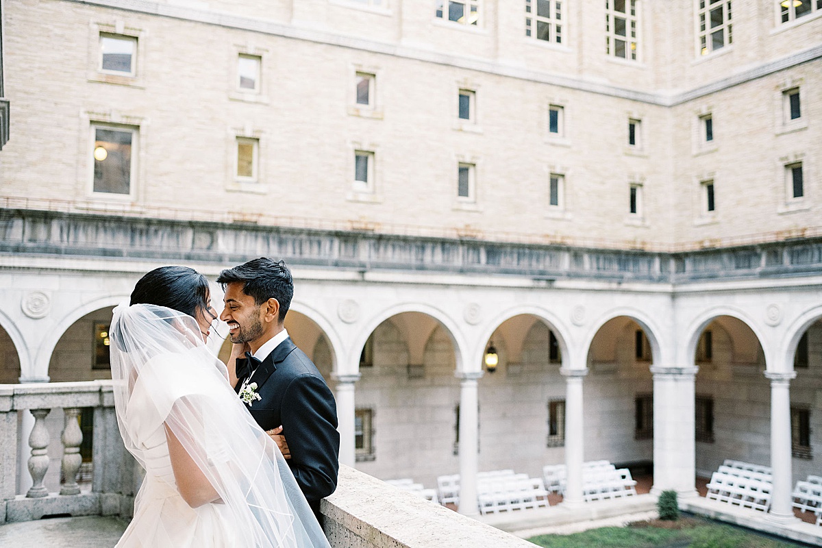 man and women really close to each other on wedding day photos by Lynne Reznick Photography 