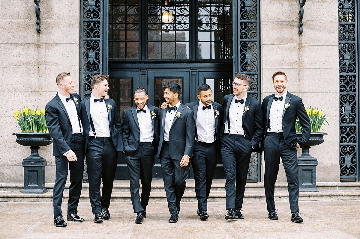 men walking together for their groom portraits photos by Lynne Reznick Photography 