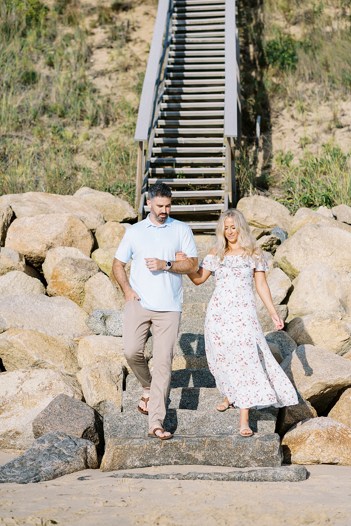 couple walking down steps captured by Lynne Reznick photography