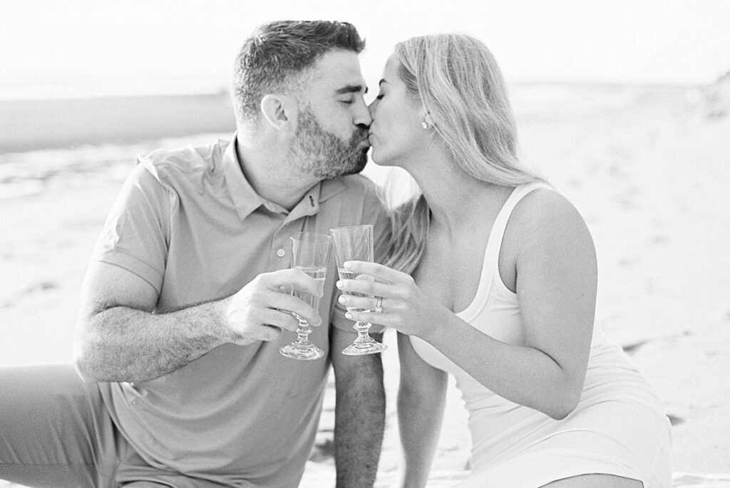 black and white of engaged couple on Eastham Cape Cod beach
